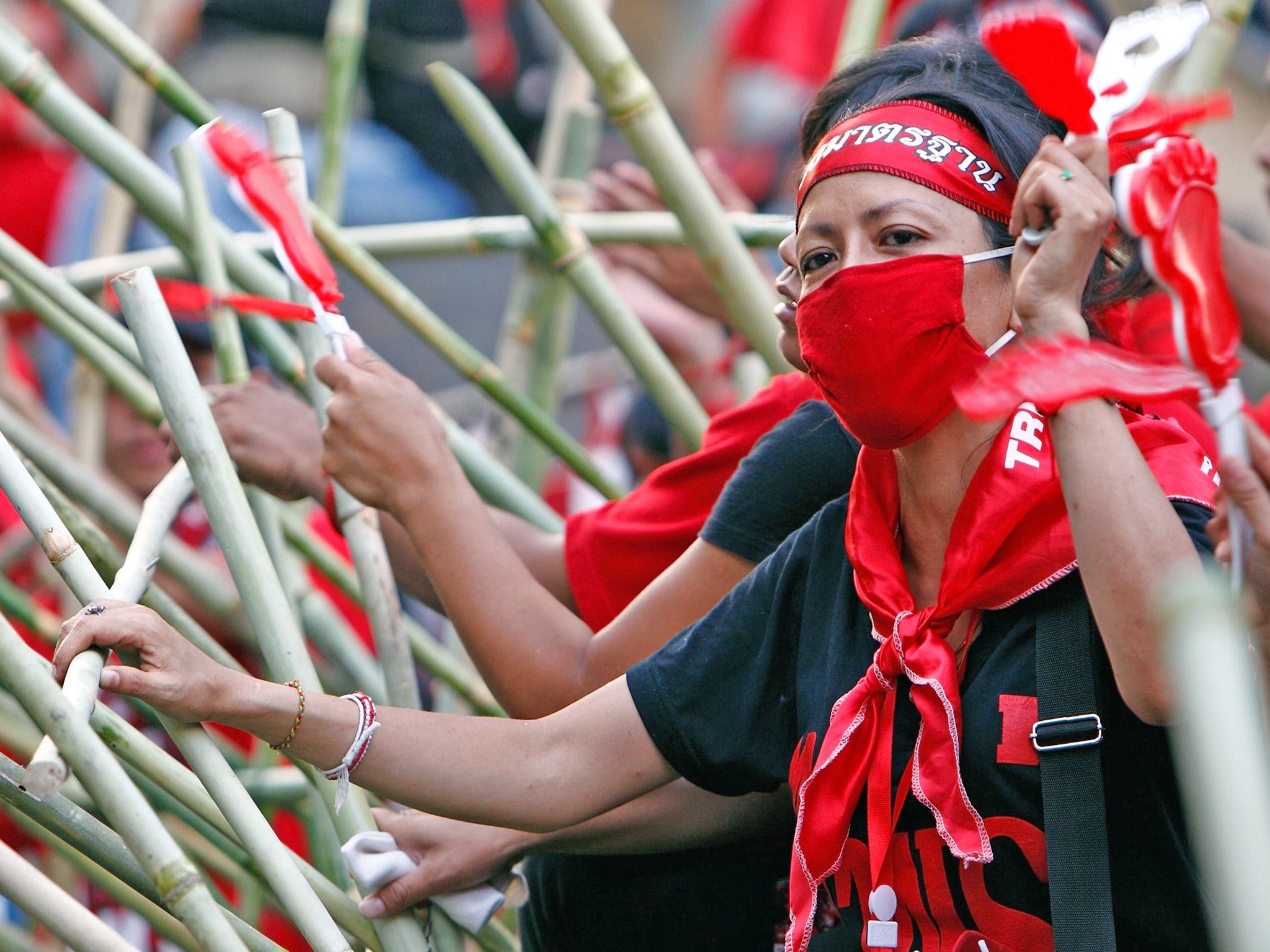 Red Shirt supporters of the ousted Premier Thaksin Shinawatra earlier this year