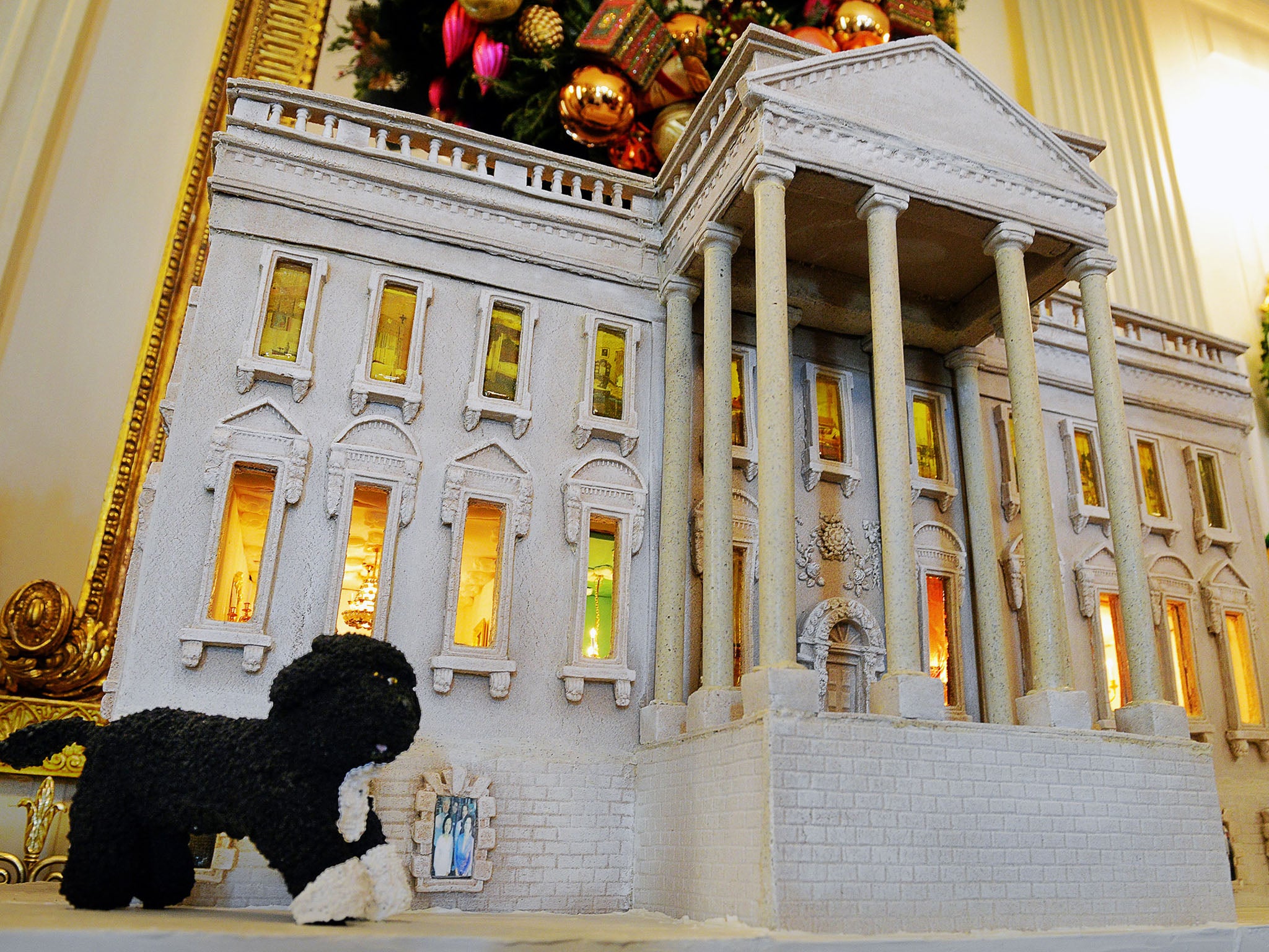 WHITEHOUSE HOLIDAY: This year's holiday decorations at the White House include a replica of the president's home, rendered in gingerbread to mimic the building's original colour.
