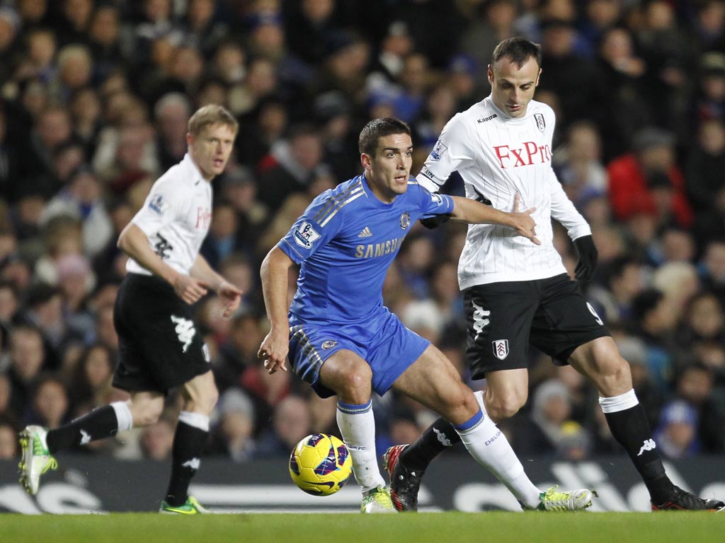 Oriol Romeu up against Dimitar Berbatov