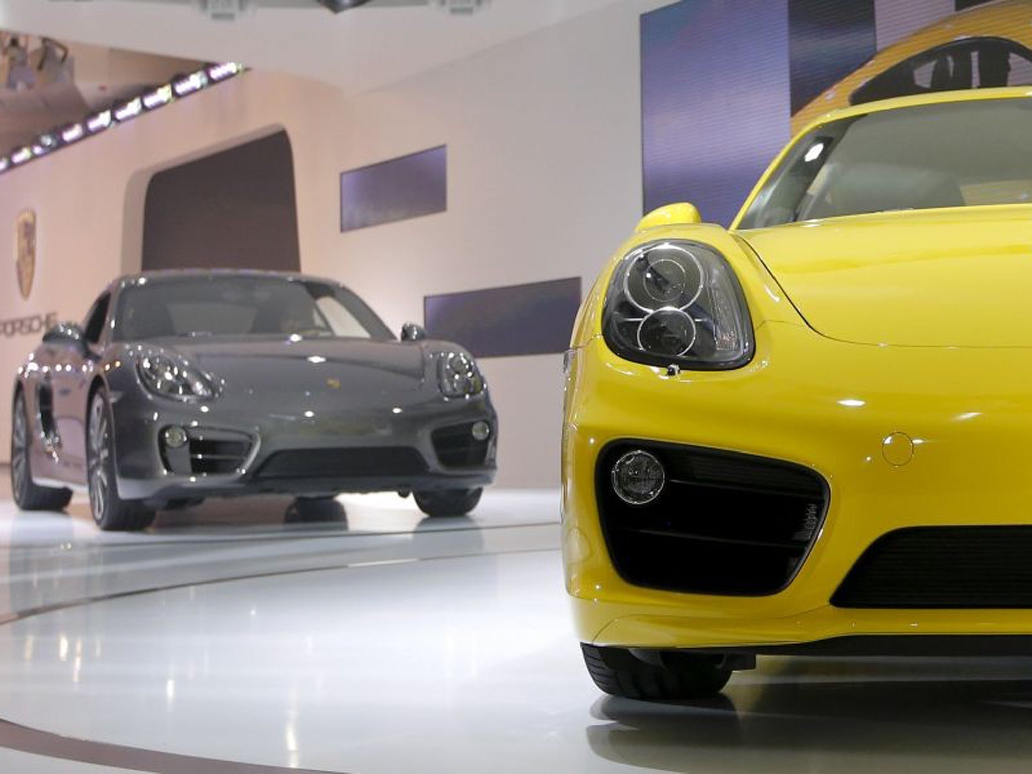 The new Porsche Caymans are introduced at the LA Auto Show