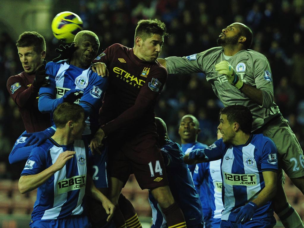 Ali Al Habsi in action against Manchester City