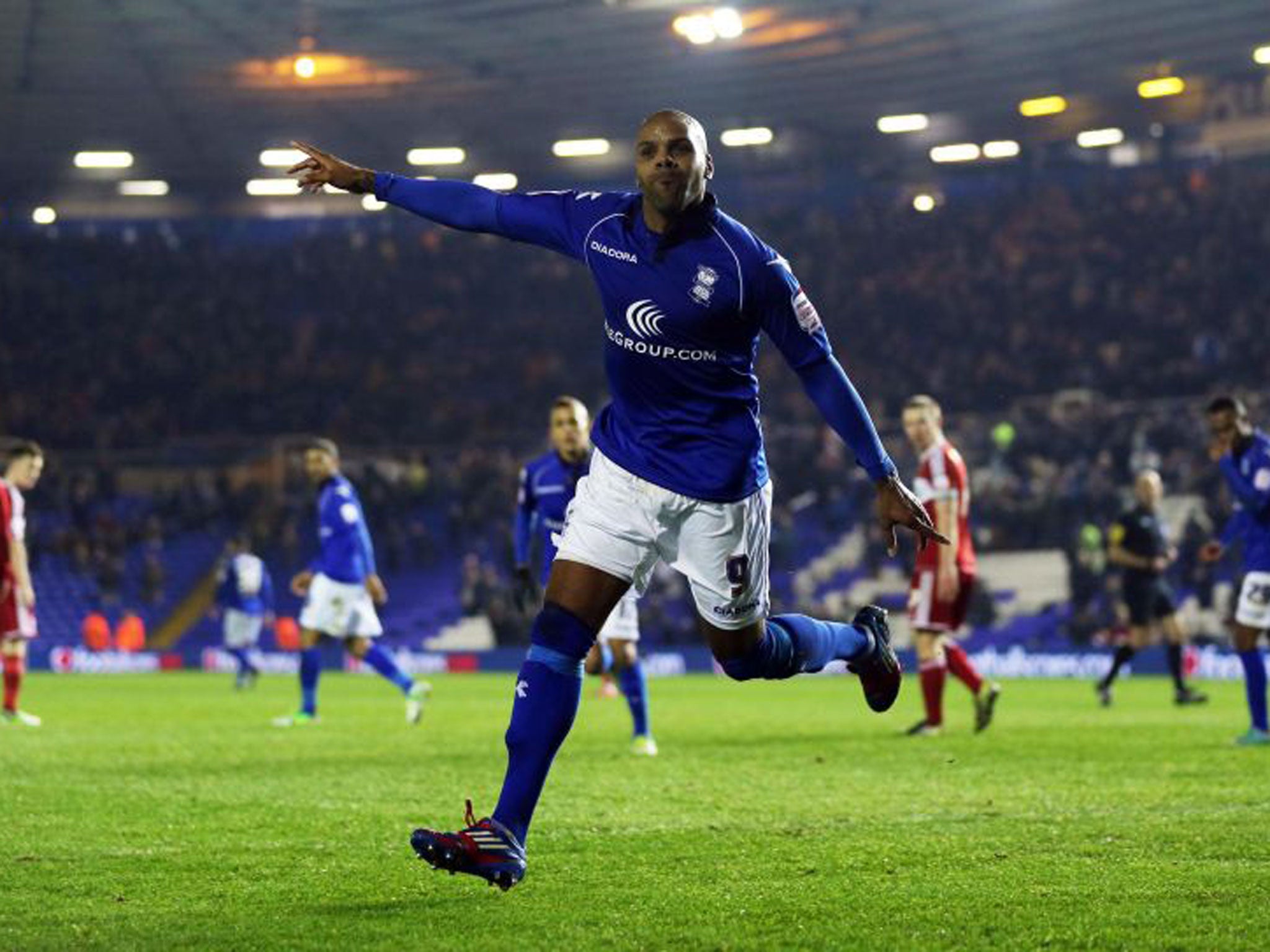 Marlon King celebrates after scoring his first goal last night