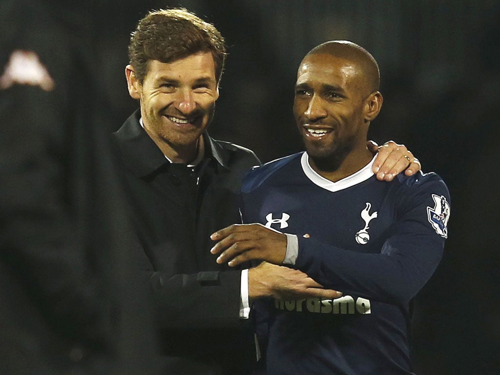 ndre Villas-Boas congratulates Jermain Defoe on his second goa