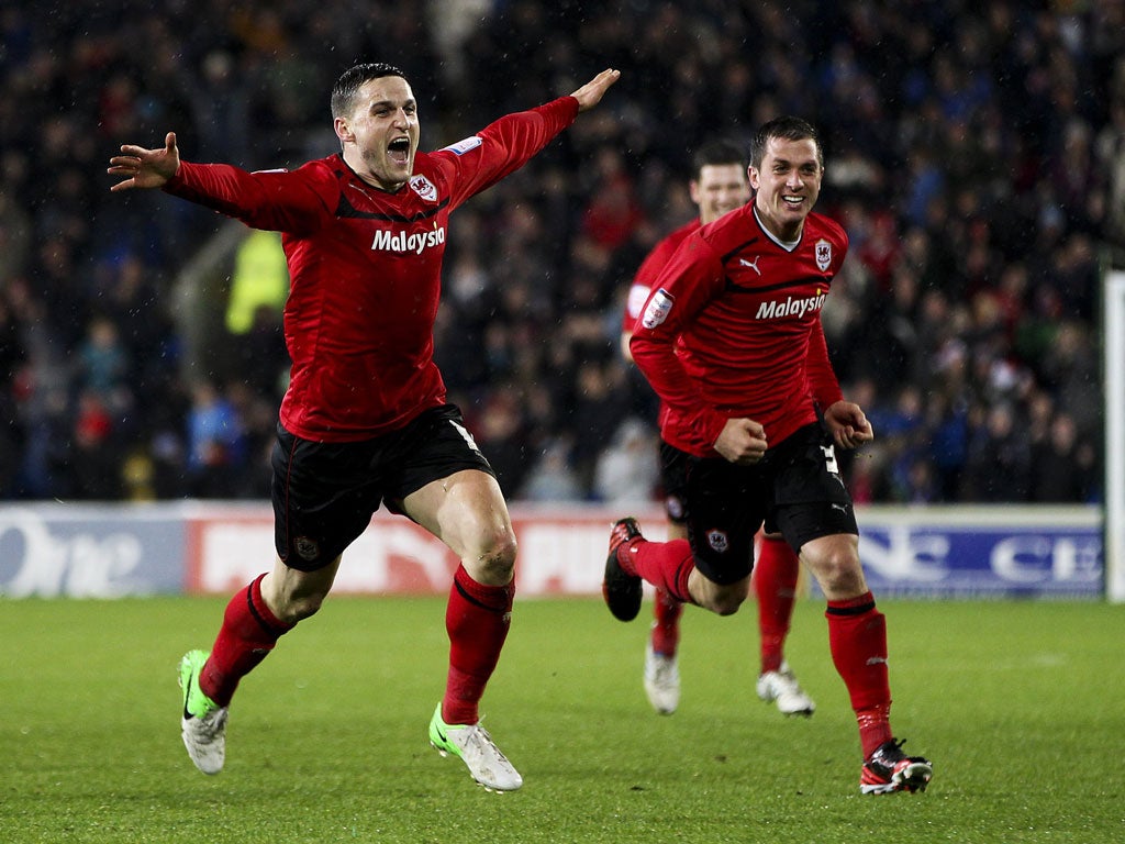 Craig Conway (left), of Cardiff, celebrates after scoring the winner