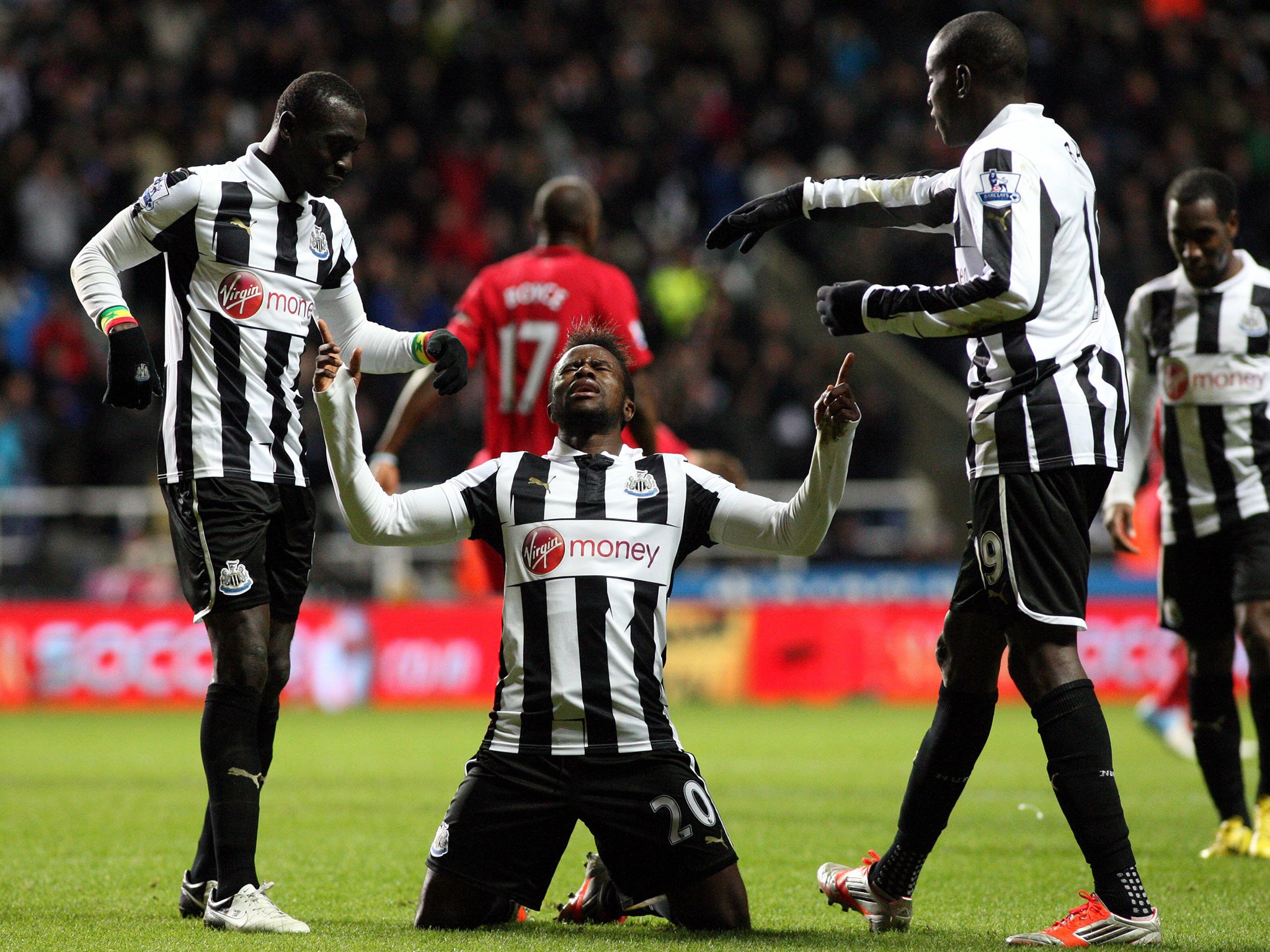 Newcastle United's Gael Bigirimana, centre, celebrates his goal against Wigan