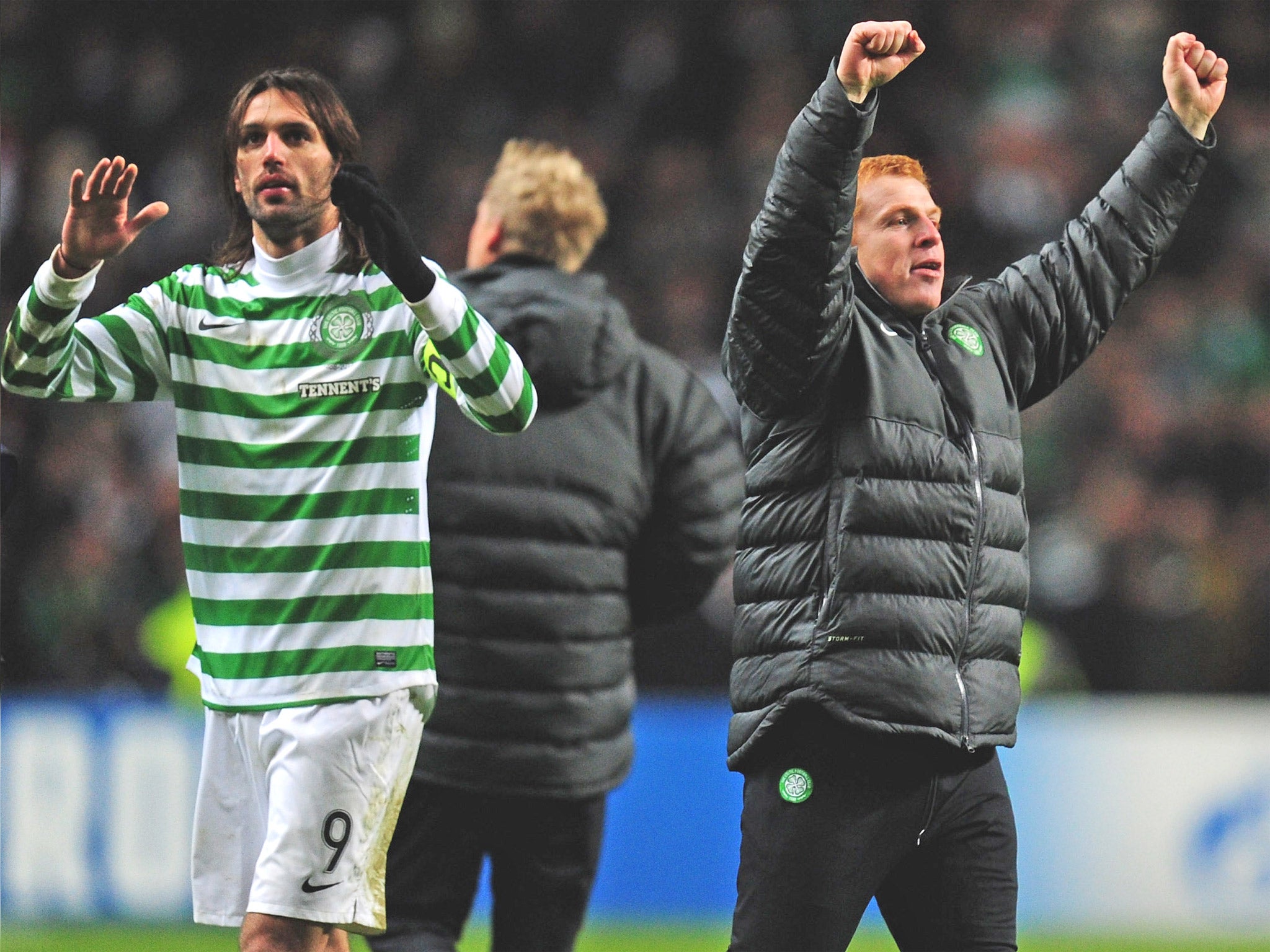 Celtic's Giorgos Samaras and manager Neil Lennon celebrate at the final whistle
