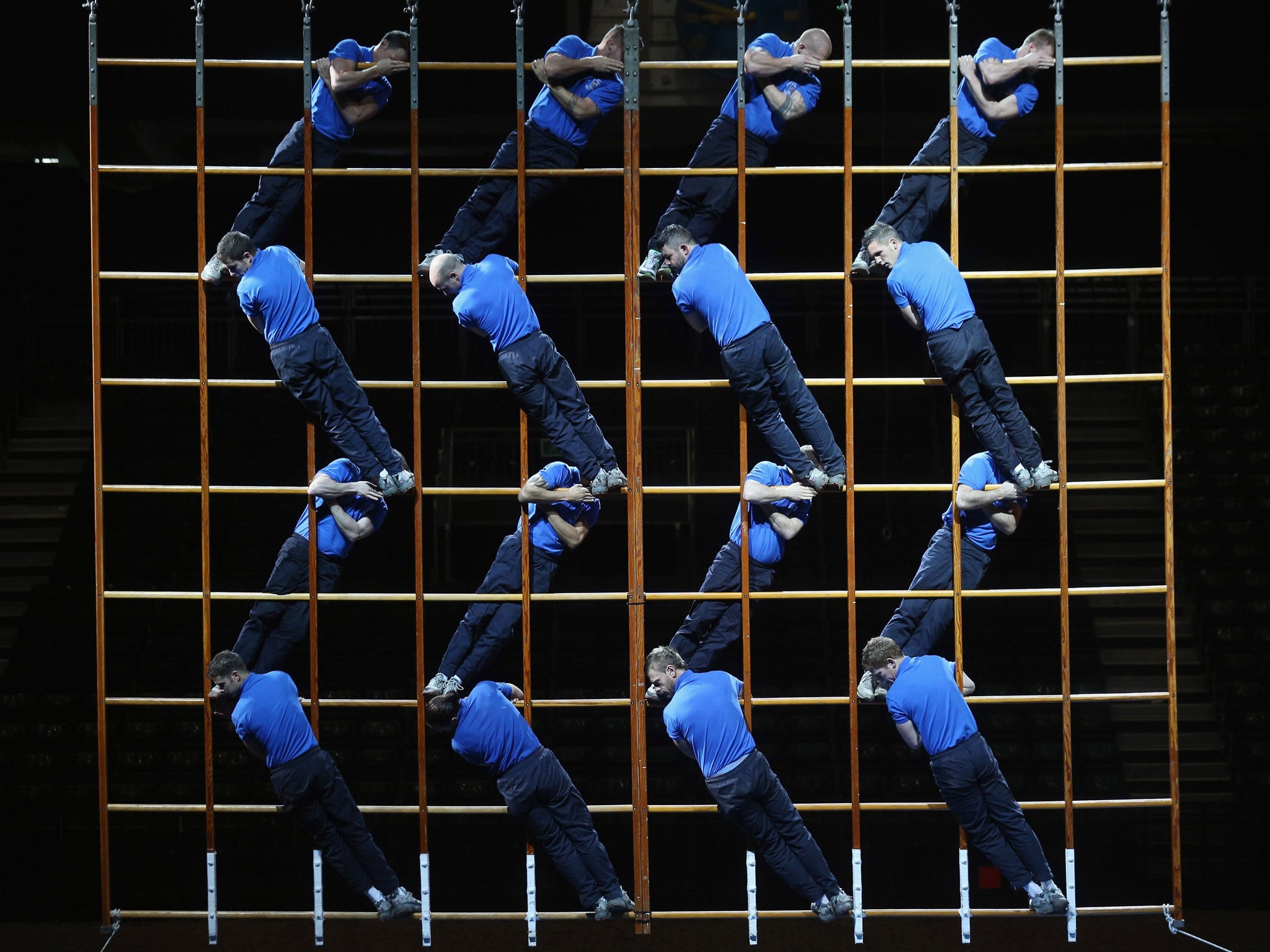 Royal Navy personnel practise their ladder routine