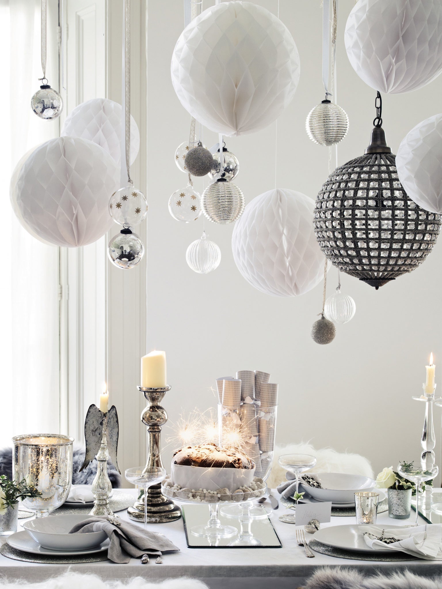 White out: Keep the table free for food by hanging decorations from the ceiling or light fittings. From £4, thewhitecompany.com