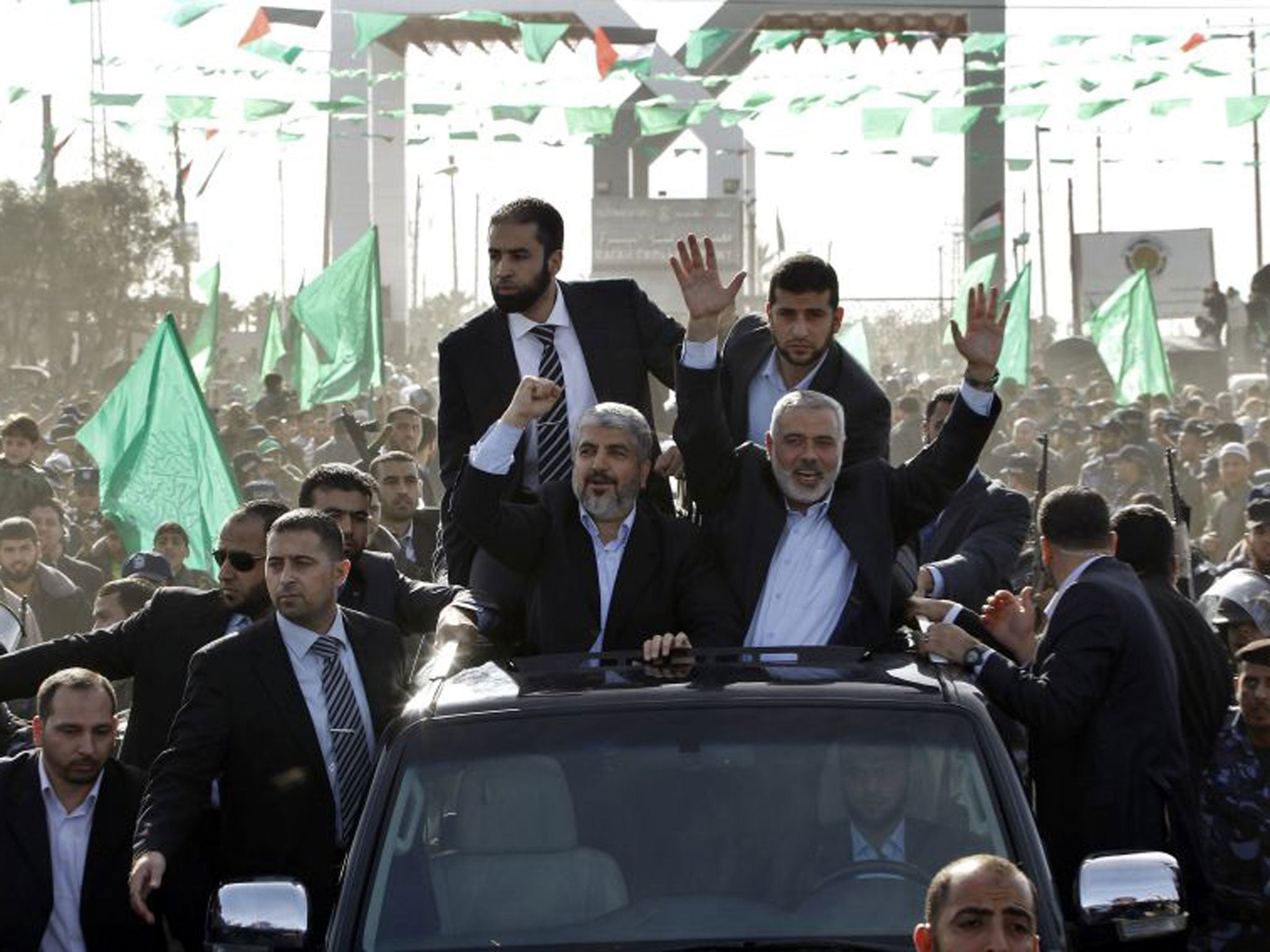 Hamas chief Khaled Meshaal, front left, alongside Hamas leader Ismail Haniyeh in Gaza yesterday