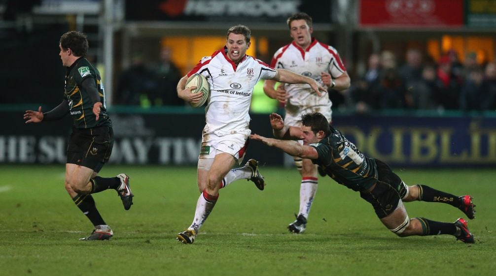 Ulster’s Darren Cave breaks away at Franklin’s Gardens last night