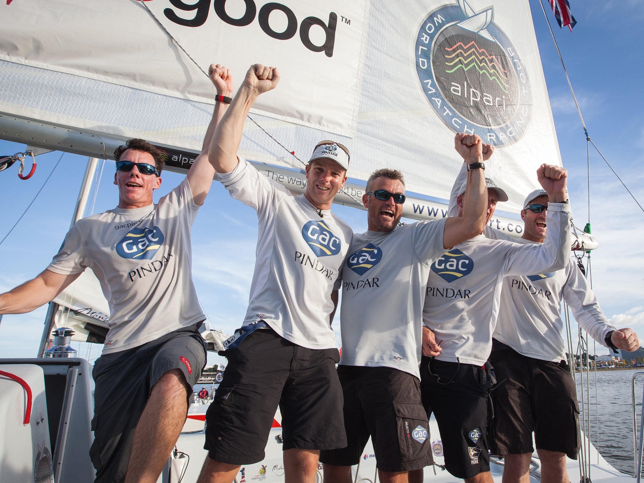 Ian Williams (second from left) celebrates with his Team GAC Pindar after securing in Malaysia his record-equalling fourth win in the World Match Racing Tour