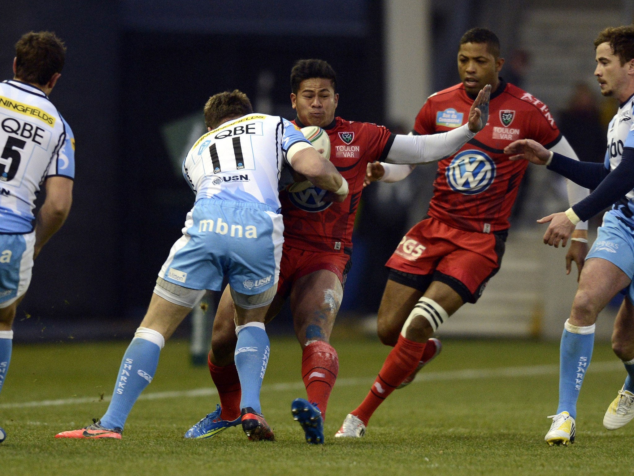 Shark attack: The Sale wing Mark Cueto tackles Toulon’s David Smith at the Salford City Stadium