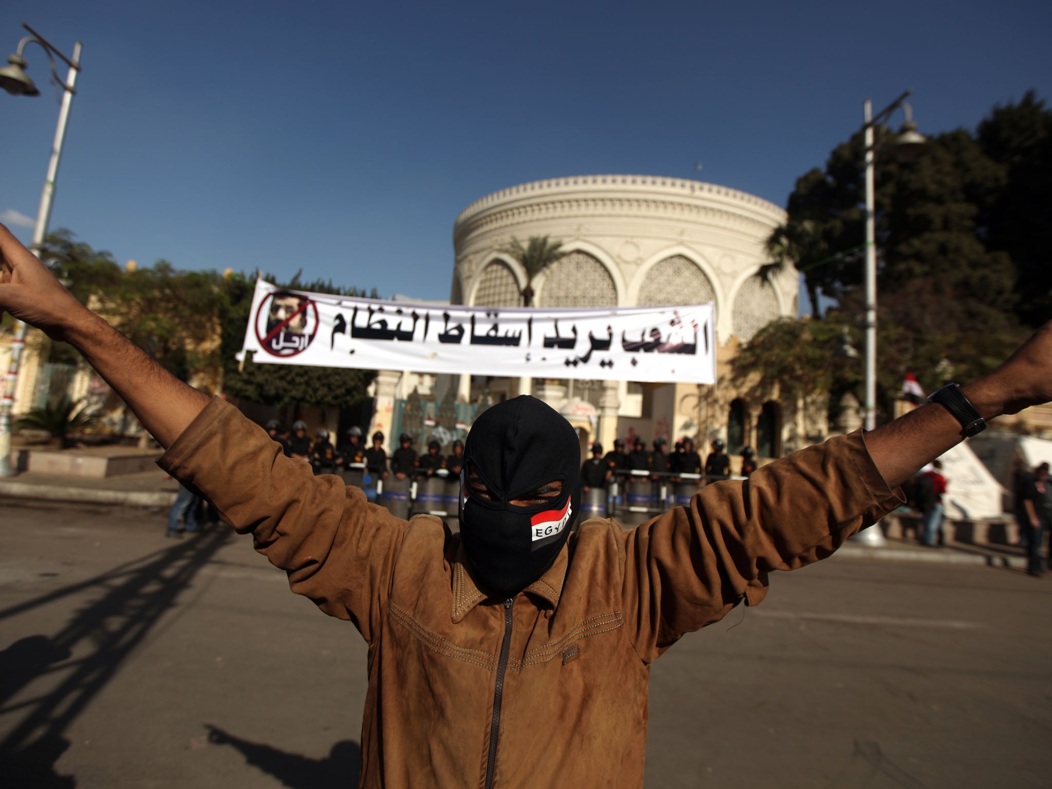 An opposition protester outside the presidential palace