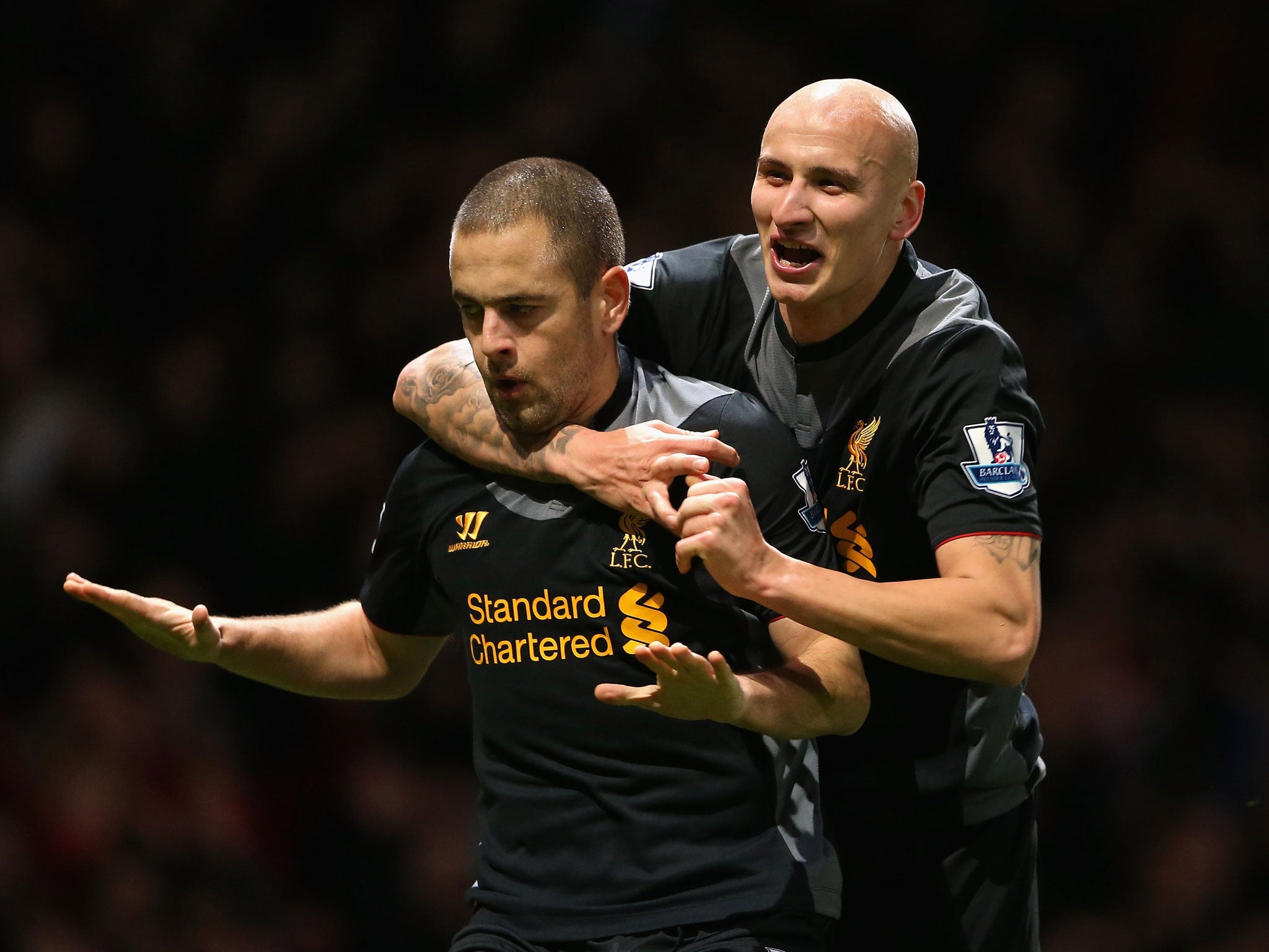 Joe Cole (L) of Liverpool celebrates his goal with Jonjo Shelvey