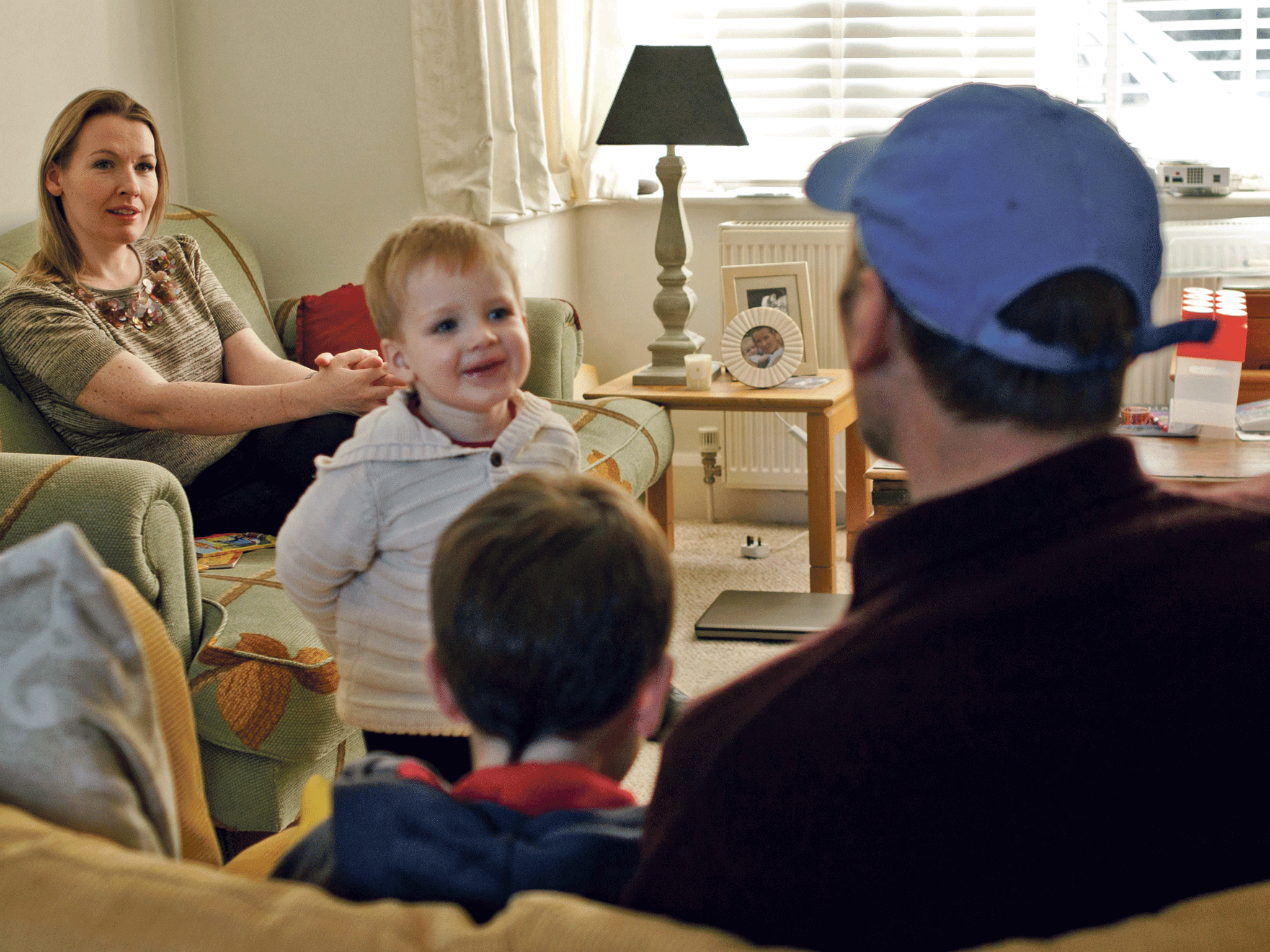 One of the family: Kathy Curran at home with 'Brian' and her two children