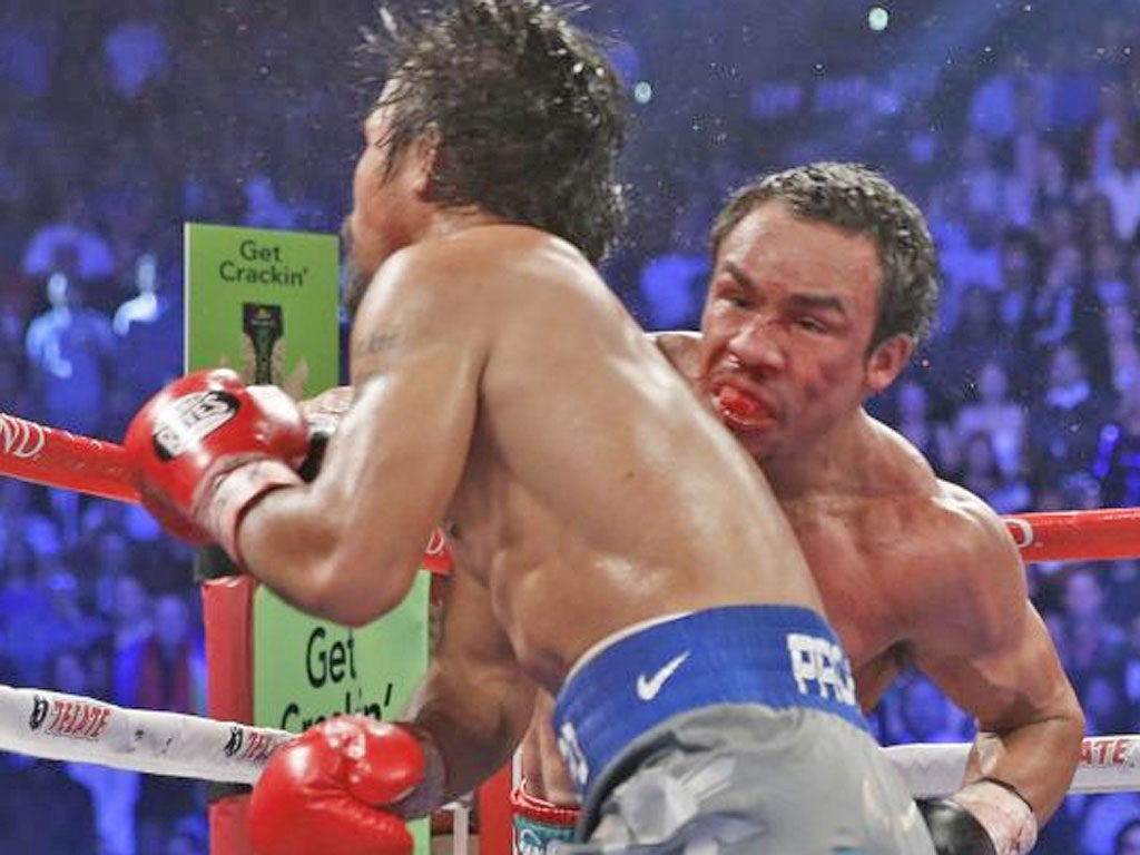Juan Manuel Marquez (right) knockouts Manny Pacquiao