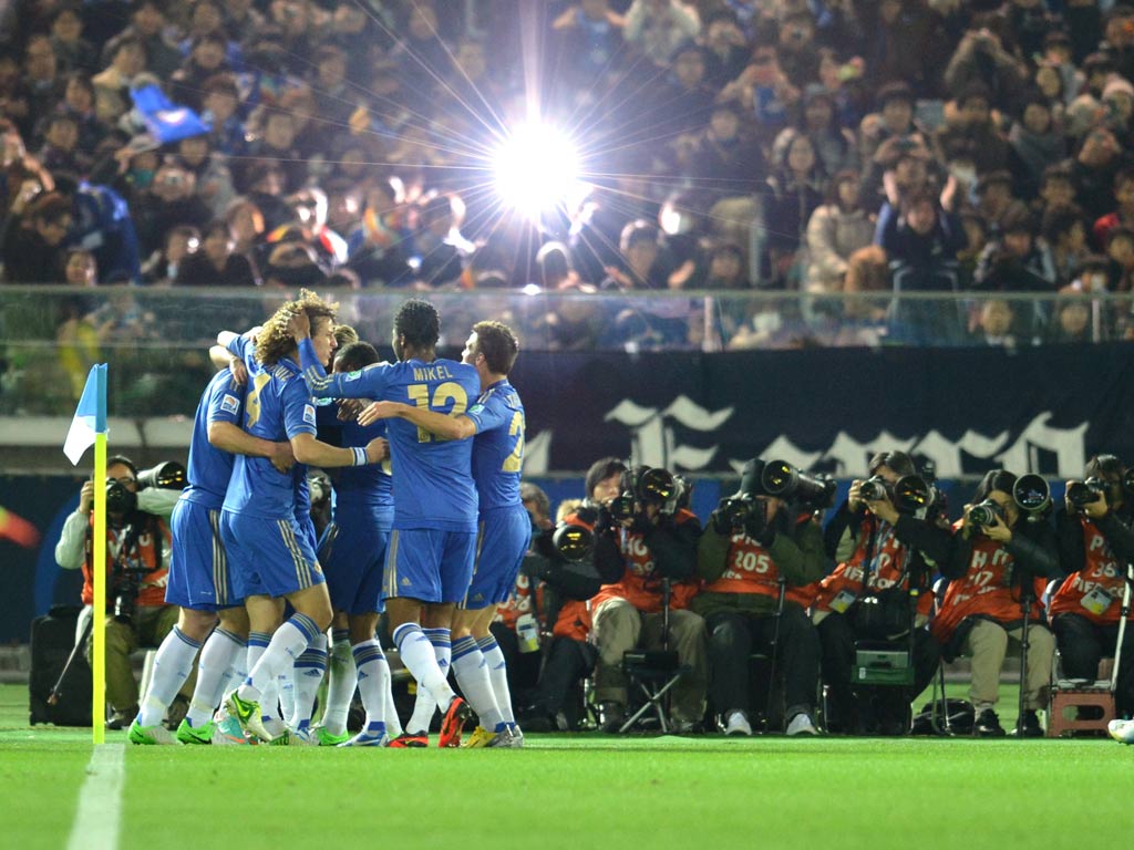 Chelsea celebrate the first goal, scored by Juan Mata