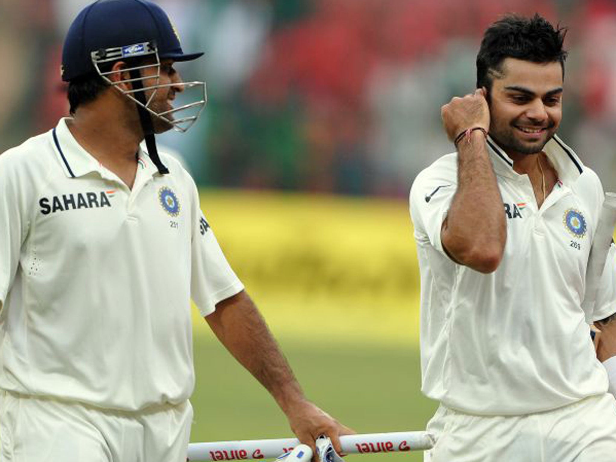 Virat Kohli (right) and captain Mahendra Singh Dhoni - playing in September