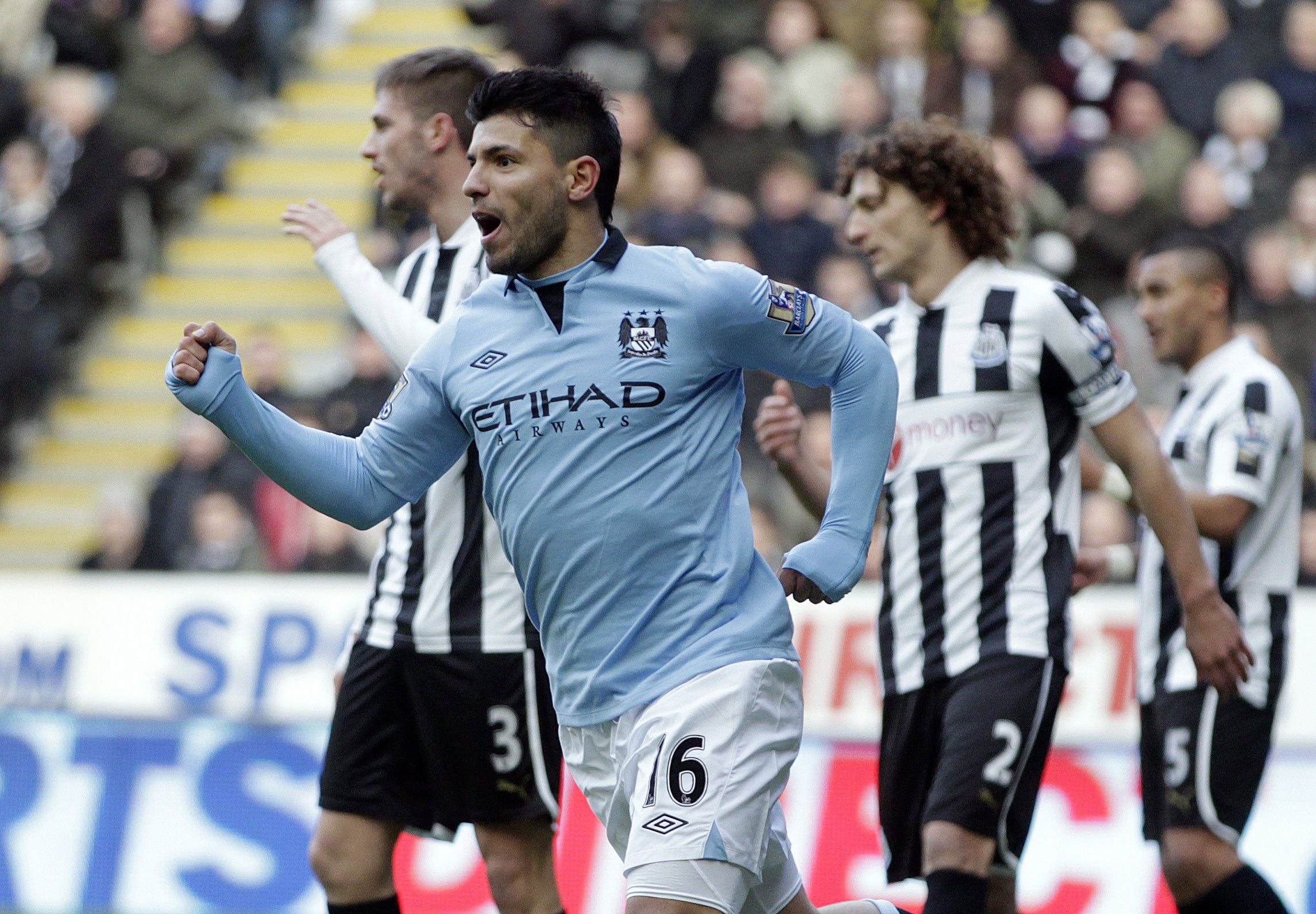 Sergio Aguero celebrates Manchester City's opening goal against Newcastle United