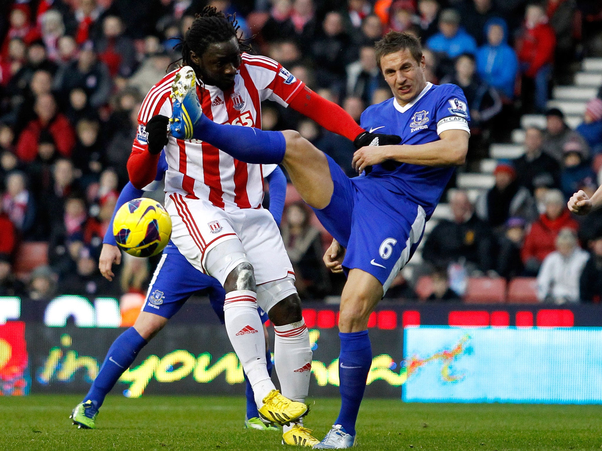 Kenwyne Jones (left) does battle with Everton's Phil Jagielka