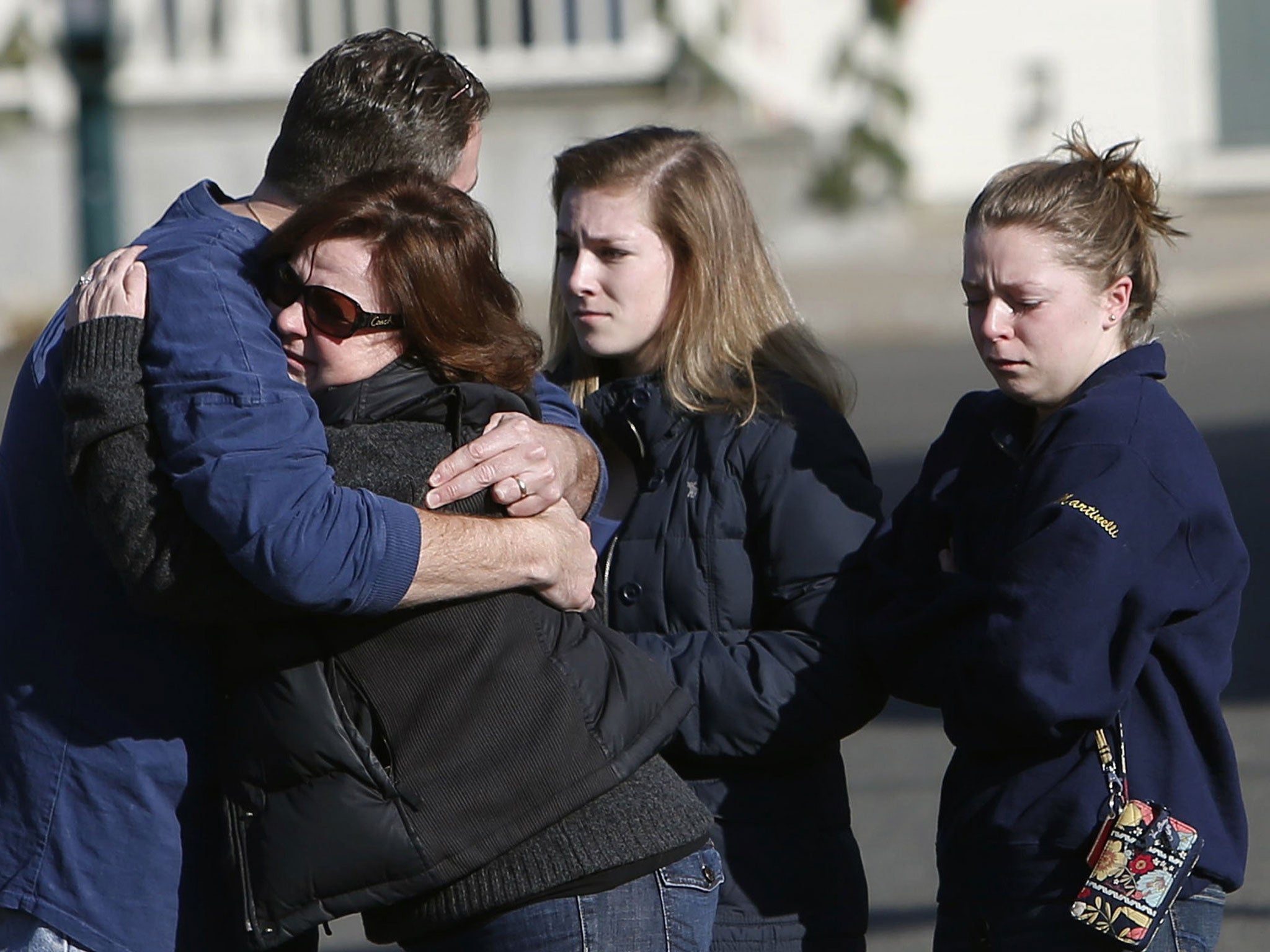 Mourners outside the Catholic church in Newtown