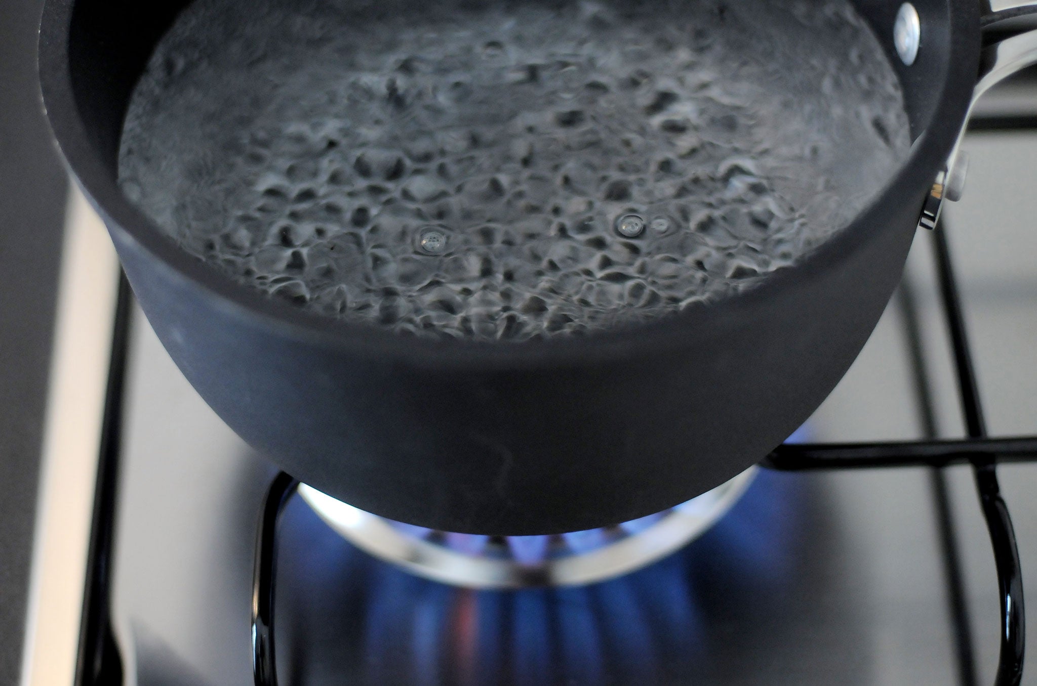 In this photo illustration water comes to the boil on a gas stove on January 8. 2009, in Milan, Italy.