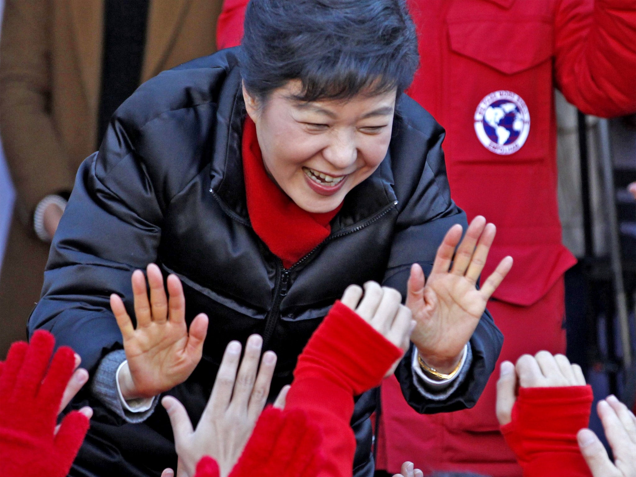 Park Geun-hye greets supporters at an election rally