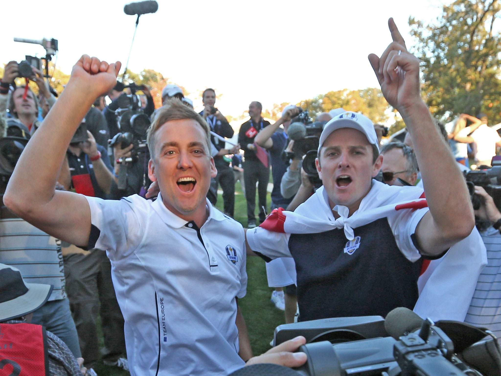 Ian Poulter and Justin Rose celebrate Europe’s dramatic victory