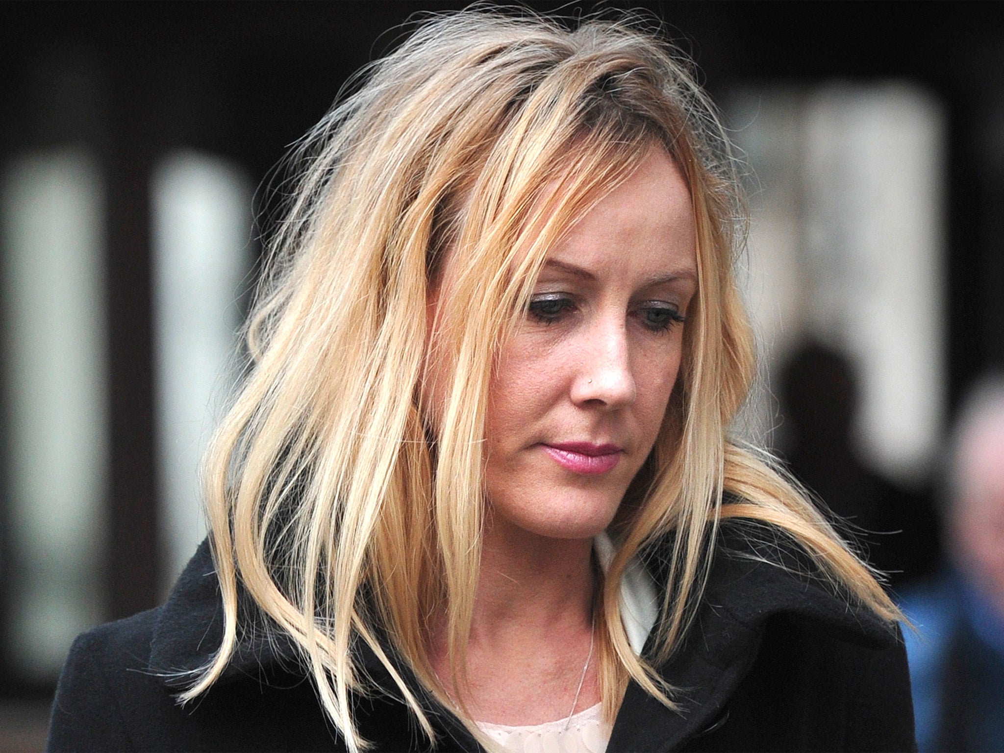 Sally Roberts, the mother of seven-year-old cancer patient Neon, leaves the High Court in central London