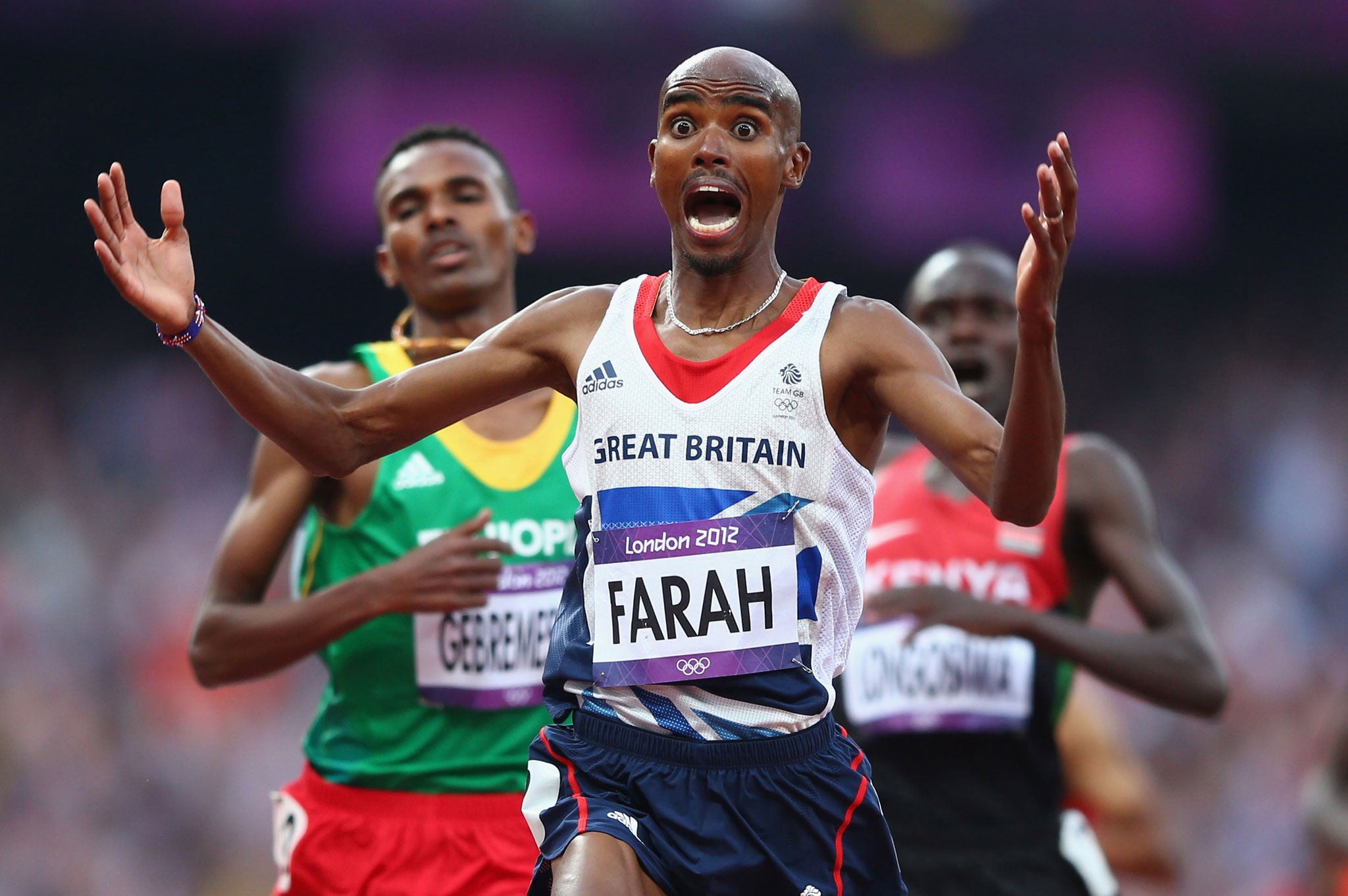 Mo Farah crossing the finishing line to win gold in the 5,000m final