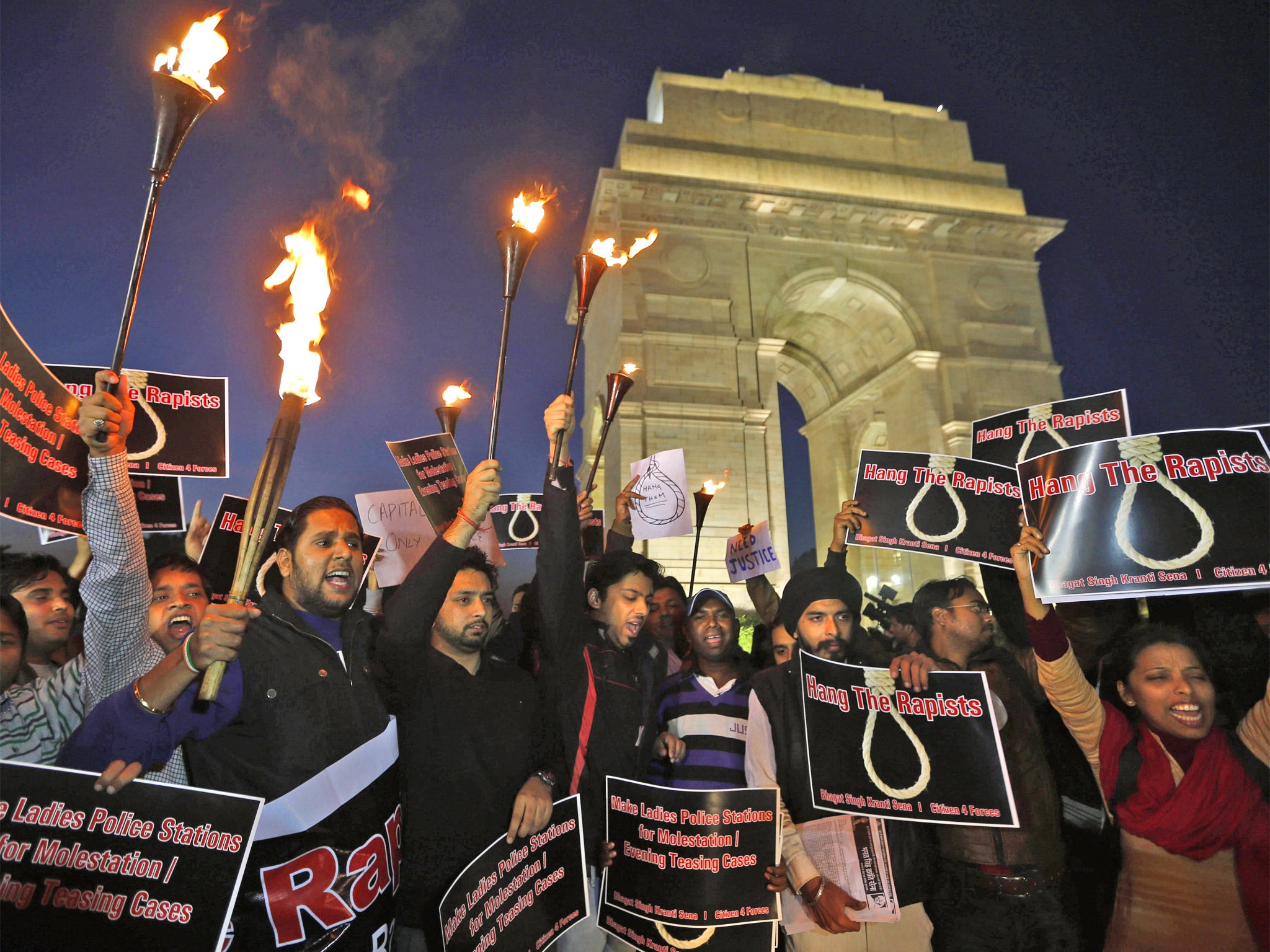 Demonstrators near India Gate in Delhi yesterday demand capital punishment for rapists