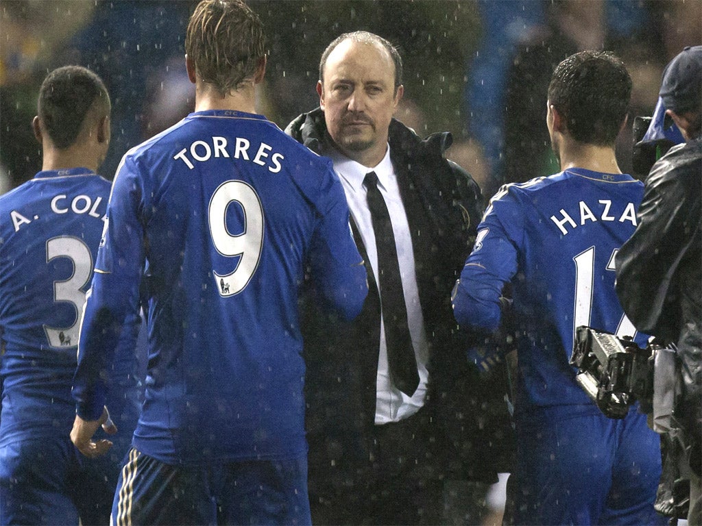 Rafa Benitez congratulates his Chelsea players last night