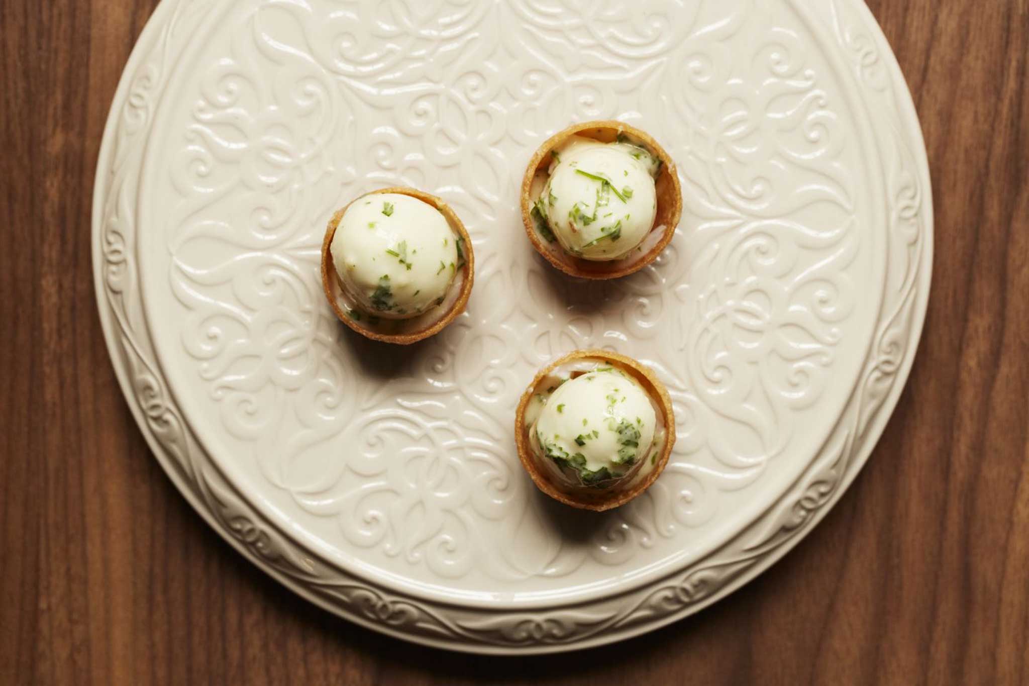 Smoked haddock and quails' egg tarts