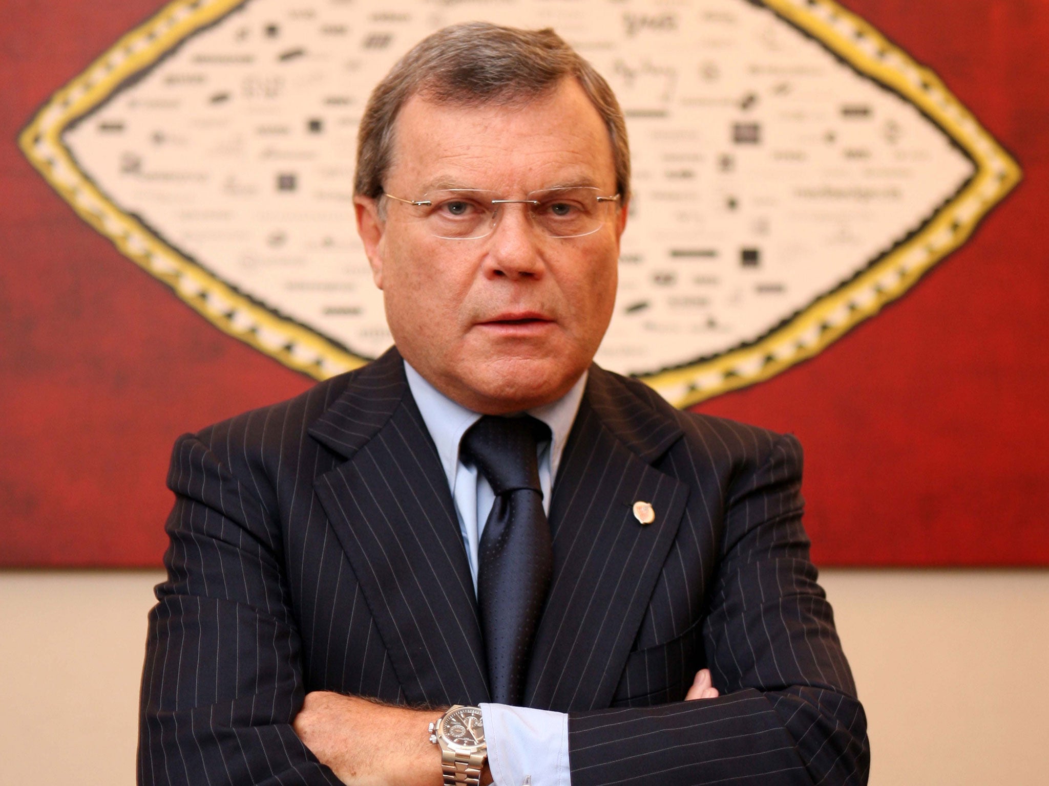 Sir Martin Sorrell, centre, whose agency is poised to pull its advertising from the channel which features hit shows such as Homeland, The Simpsons and Peep Show