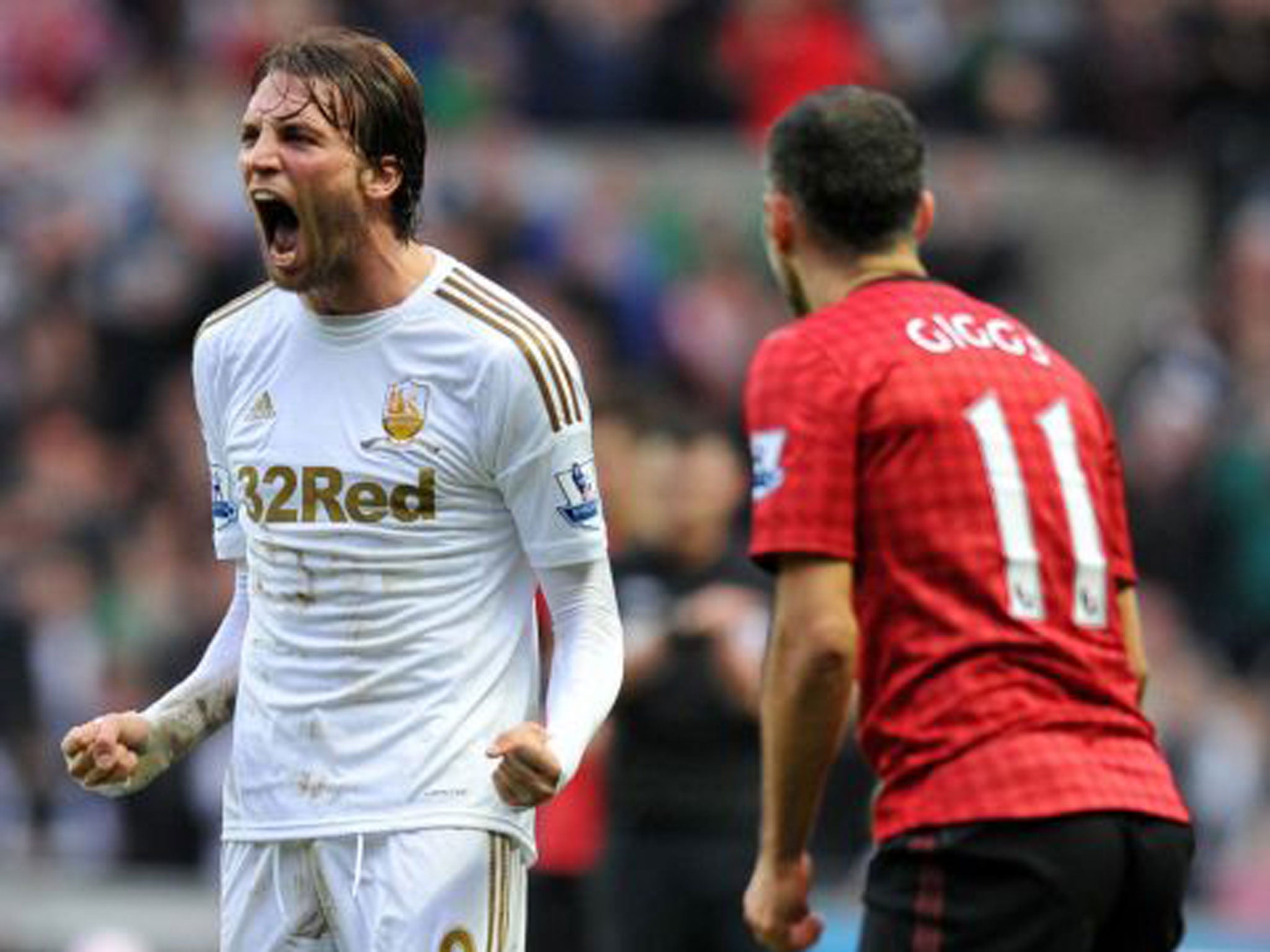 Michu celebrates his equaliser for Swansea yesterday