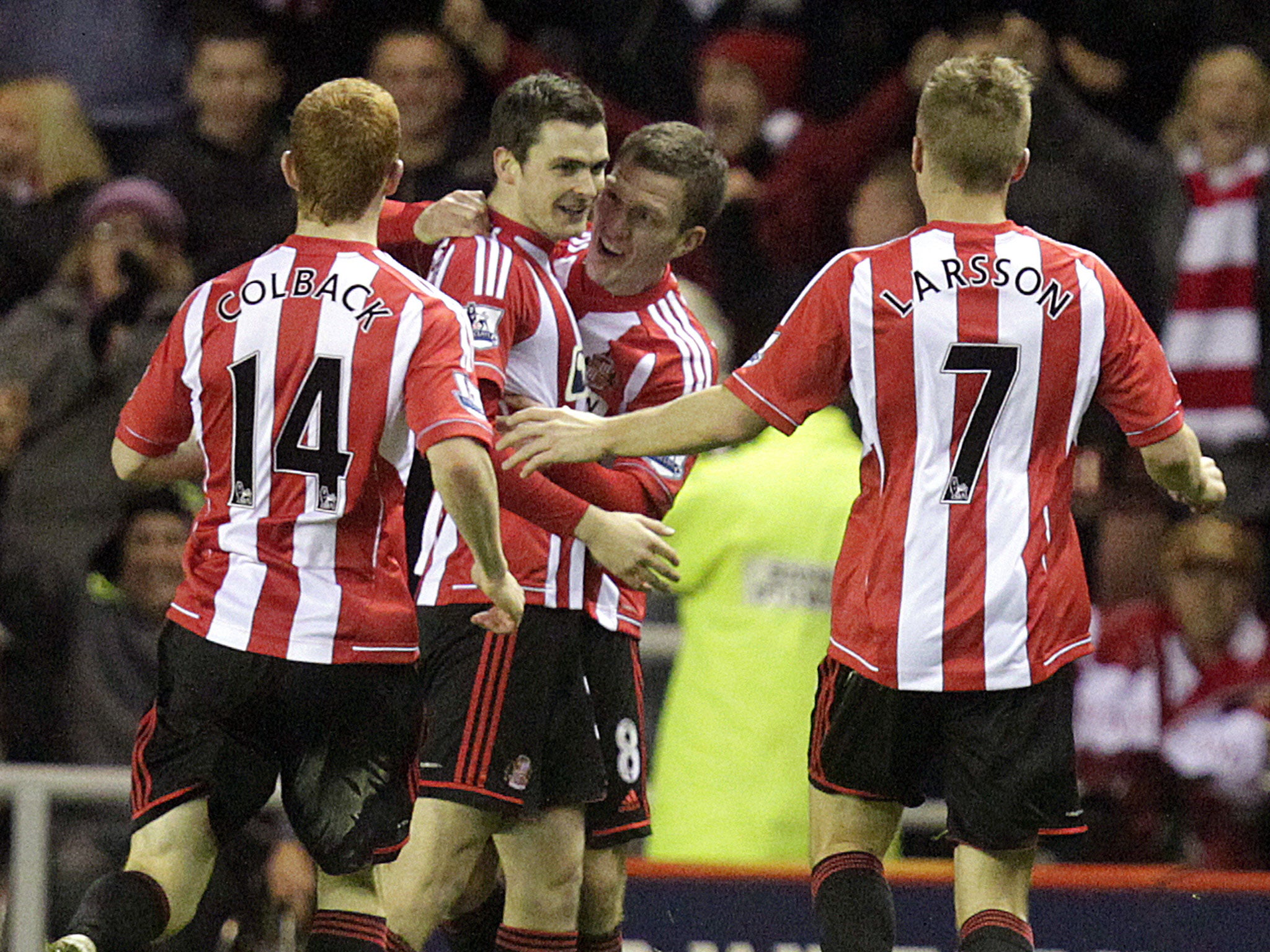 Adam Johnson celebrates his goal against his former club Manchester City