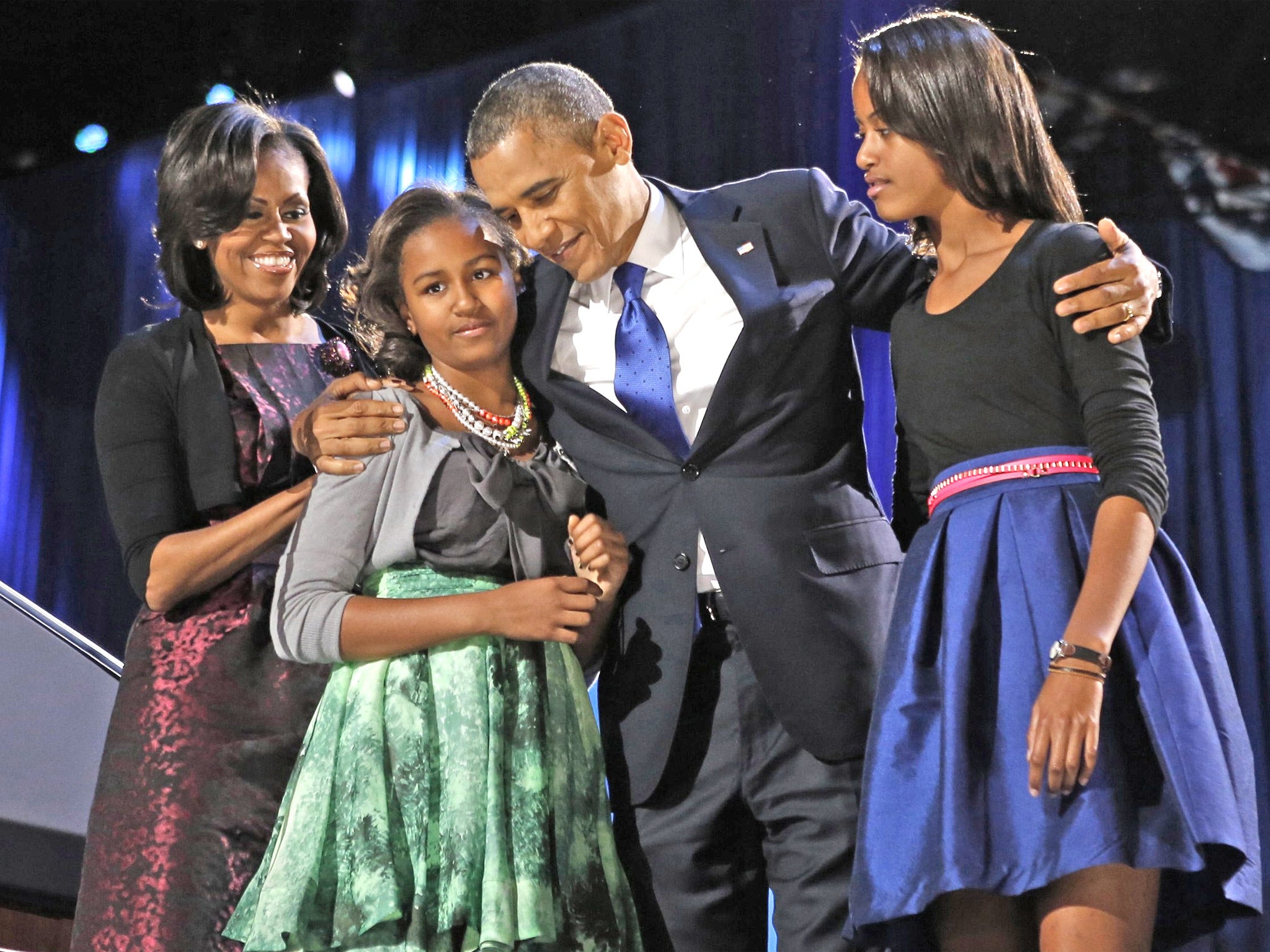 The US President, Barack Obama, celebrates his re-election with his family at a rally in Chicago