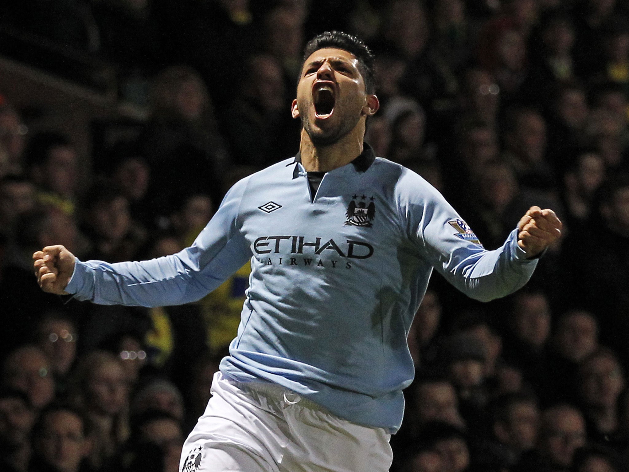 Sergio Aguero celebrates Manchester City's third goal