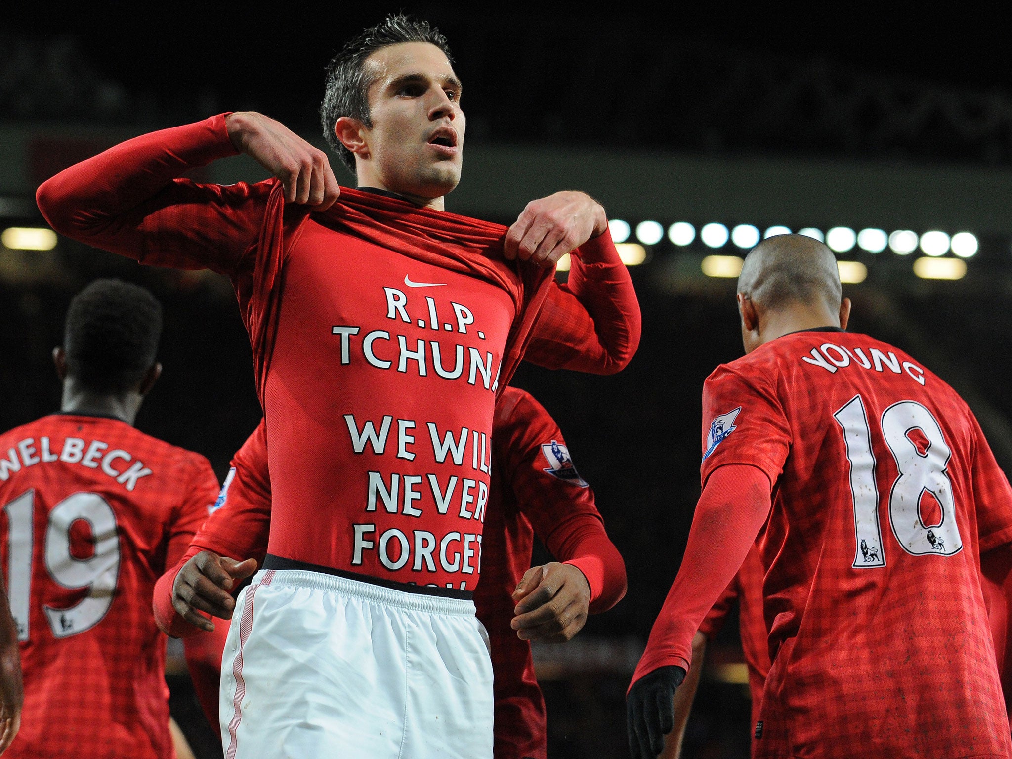Robin van Persie celebrates his goal against West Brom