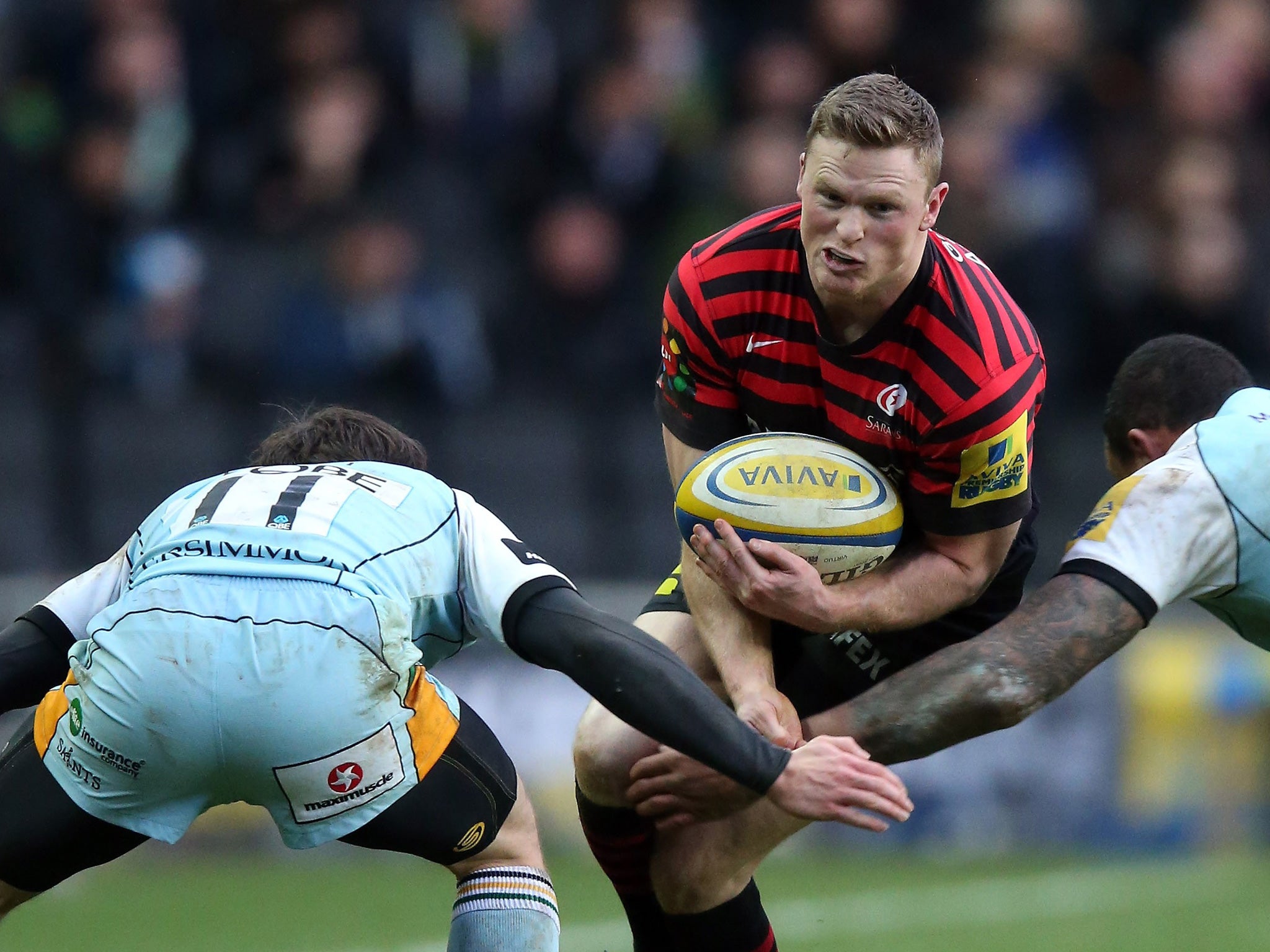 Chris Ashton of Saracens attempts to beat the Northampton cover at Stadium:MK yesterday