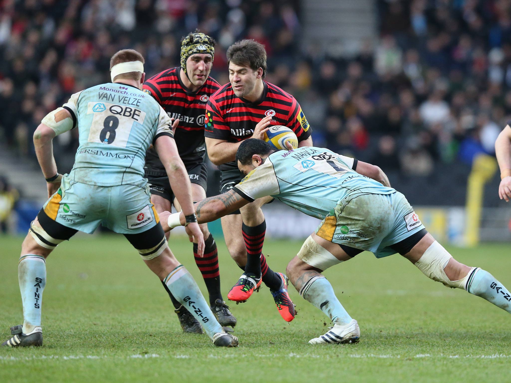 Schalk Brits of Saracens is tackled by Samu Manoa