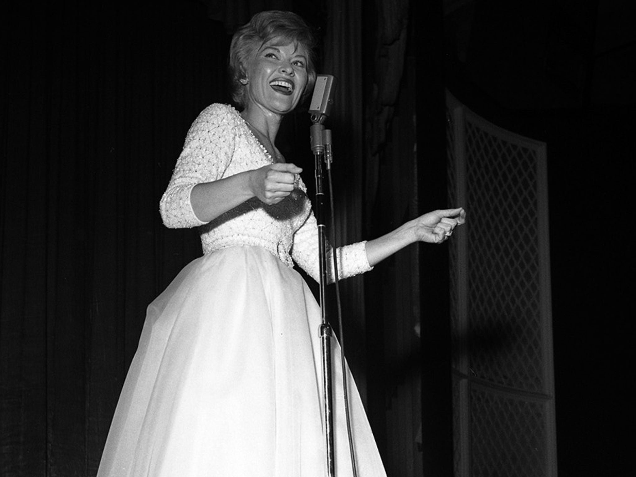 Page performs at The Dunes Hotel, Las Vegas, in 1962