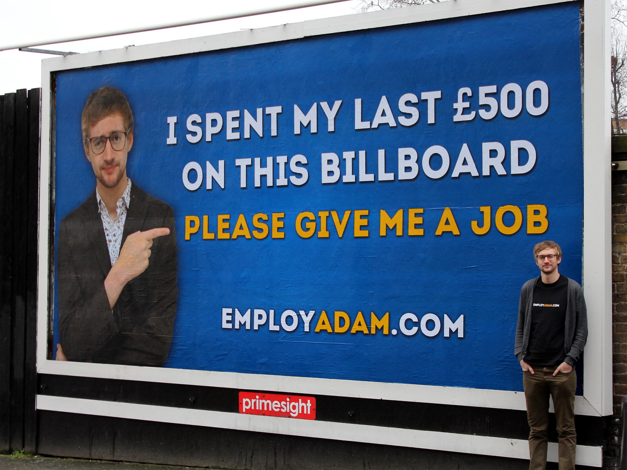 Gissa job: Adam Pacitti poses in front of the billboard he hopes will bring work