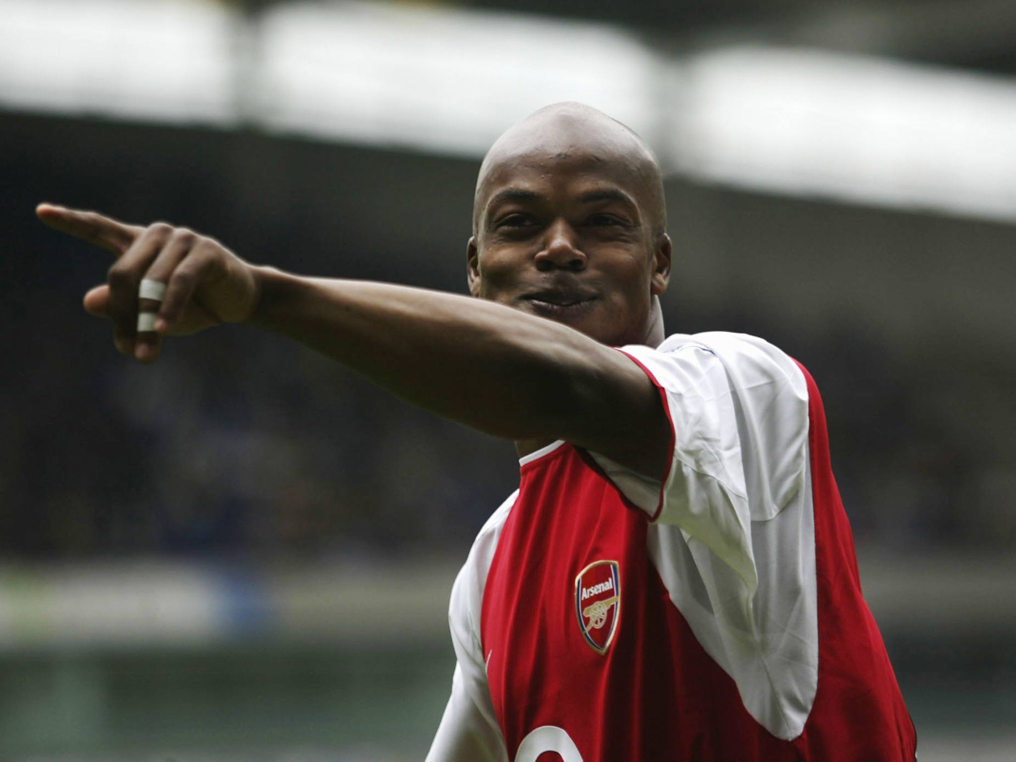 Wiltord in action for Arsenal during their unbeaten 2004 league season