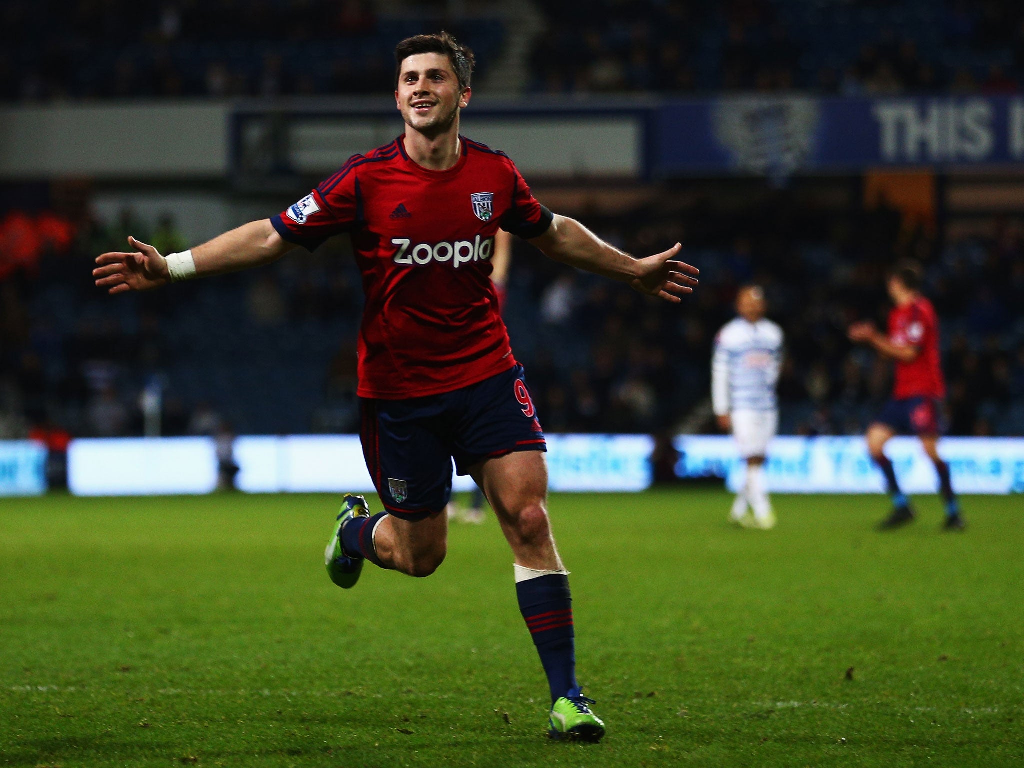 Shane Long of West Bromwich Albion celebrates scoring the first goal