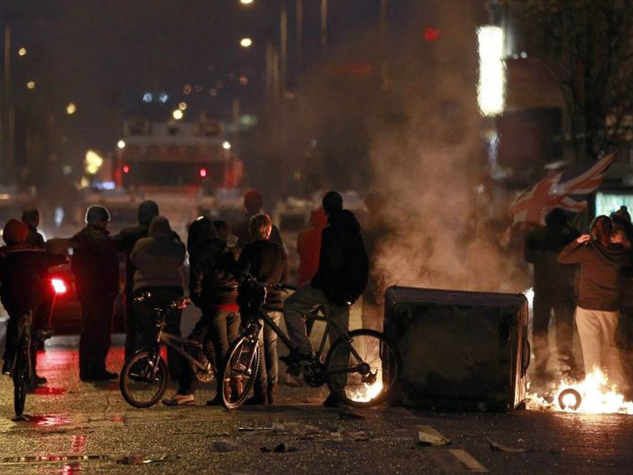 Burning debris blocks the Newtownards Road in East Belfast