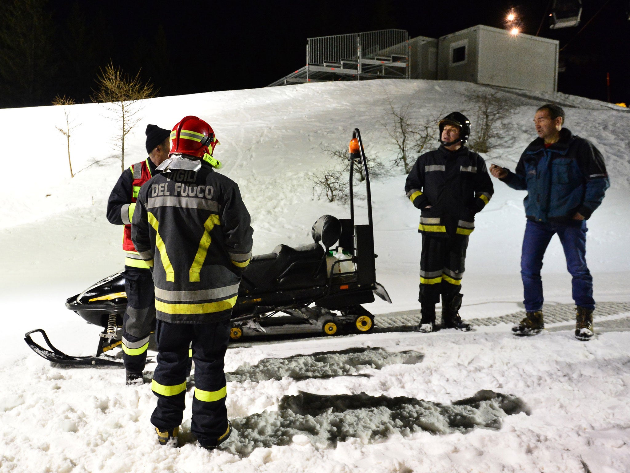 Rescuers on Mount Cermis, where the accident occurred