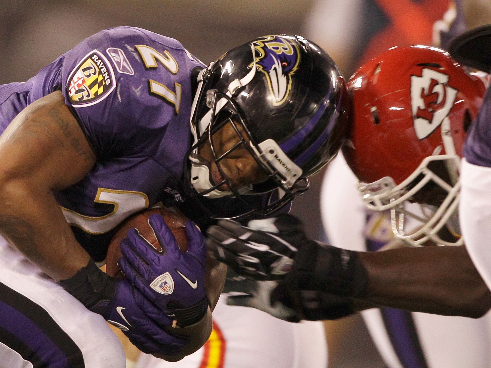 Heads you lose: Jovan Belcher (right) took a lot of hits like this in his NFL career. Last month he killed himself and his girlfriend