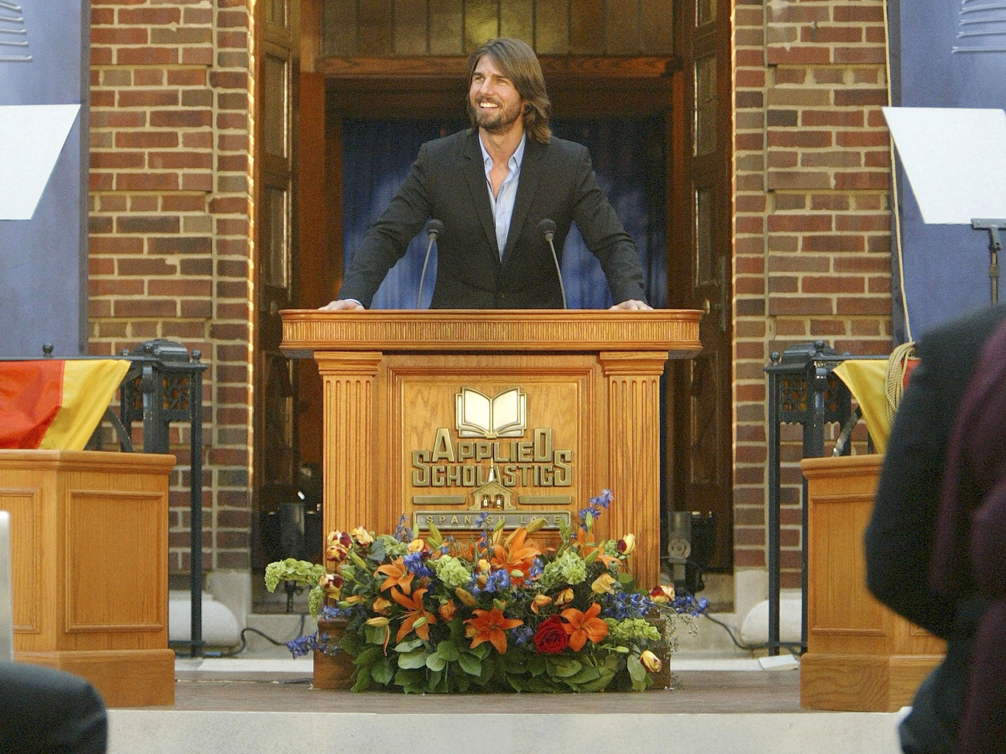 Tom Cruise at the opening of an Advanced Scholastics centre in 2003, which promotes Scientology