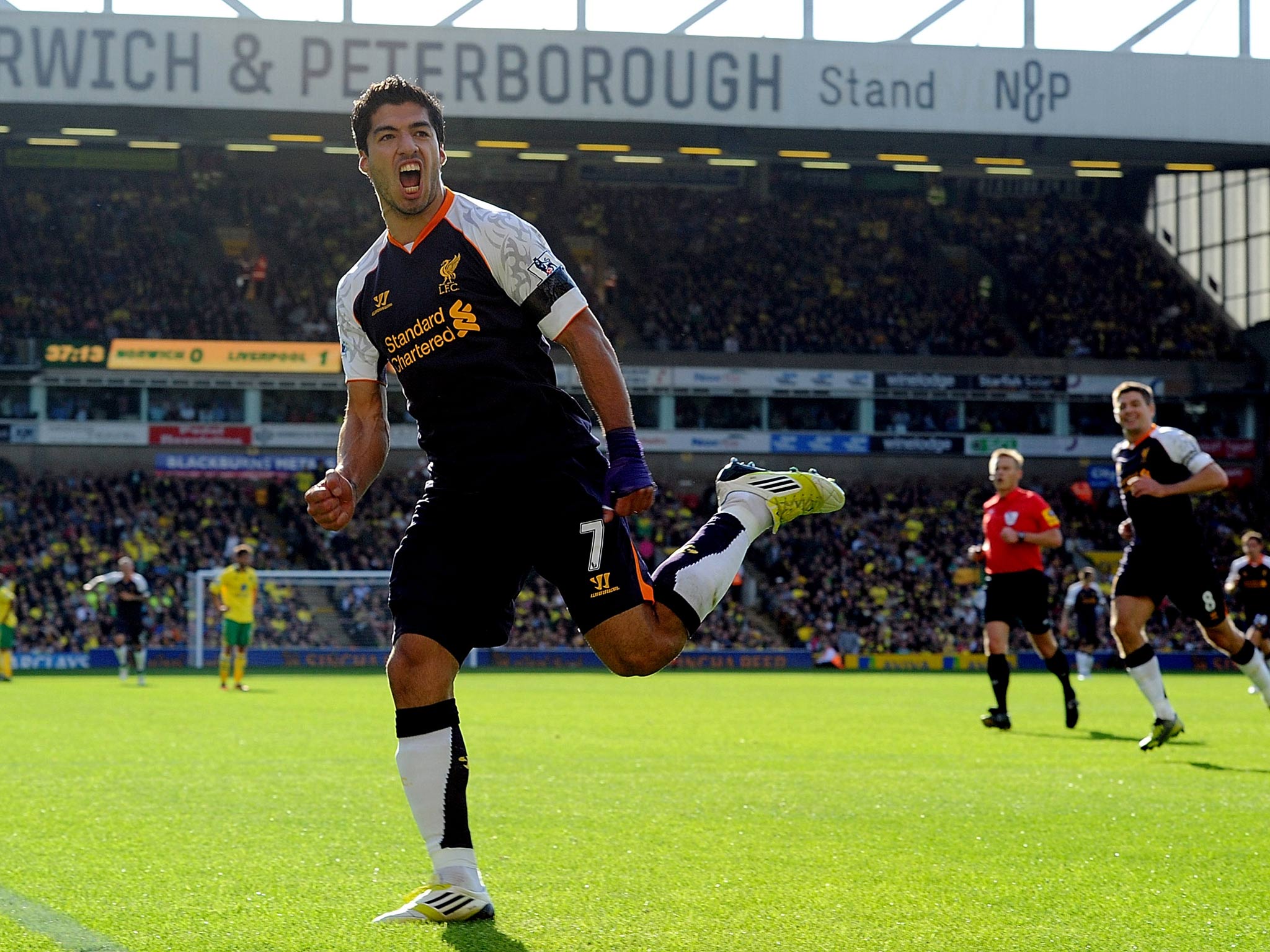 September 2012: Suarez scores a stunning hat-trick as Liverpool thrash Norwich 5-2 at Carrow Road.